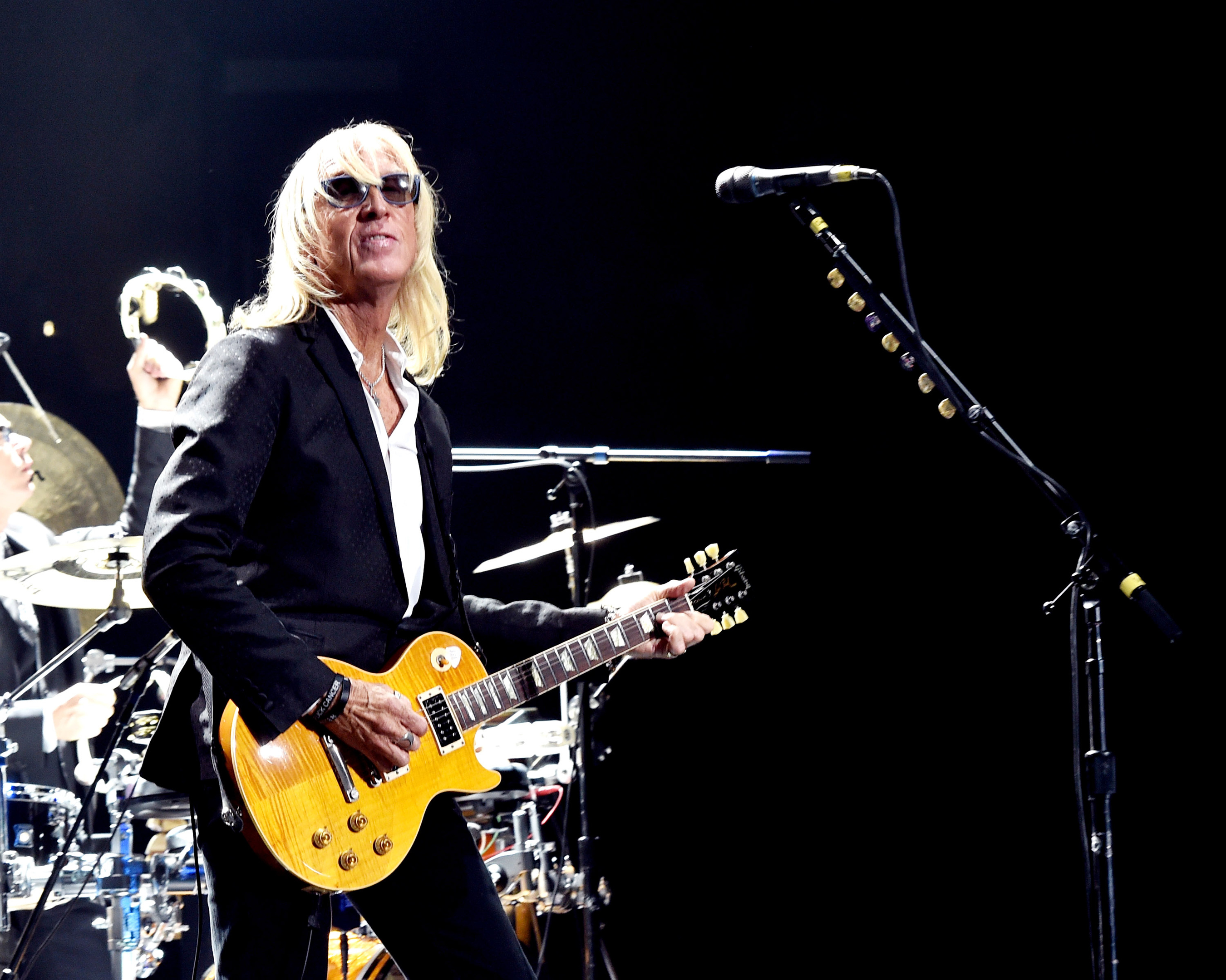 Davey Johnstone performs with Elton John at the Staples Center, LA (Kevin Winter/Getty Images)