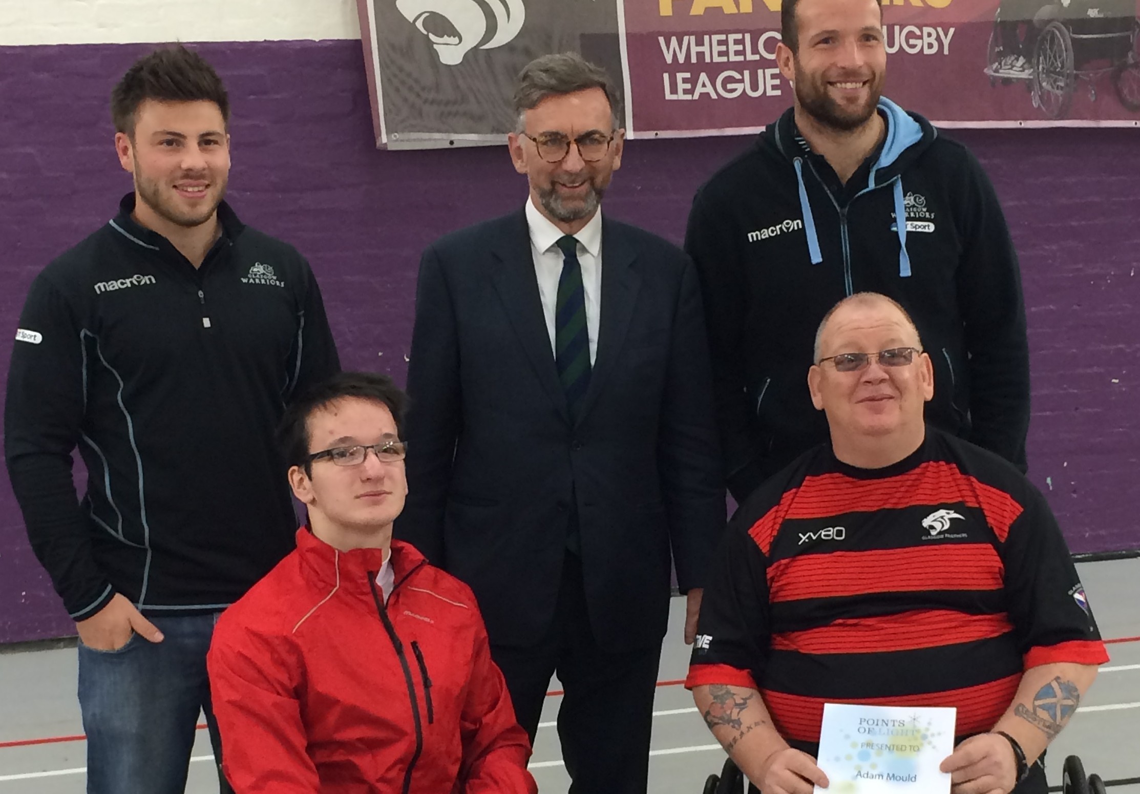 Adam (front right) with former Panthers player Sean Frame (front left), Lord Dunlop (back centre) and Glasgow Warriors players James Eddie and Ali Price.