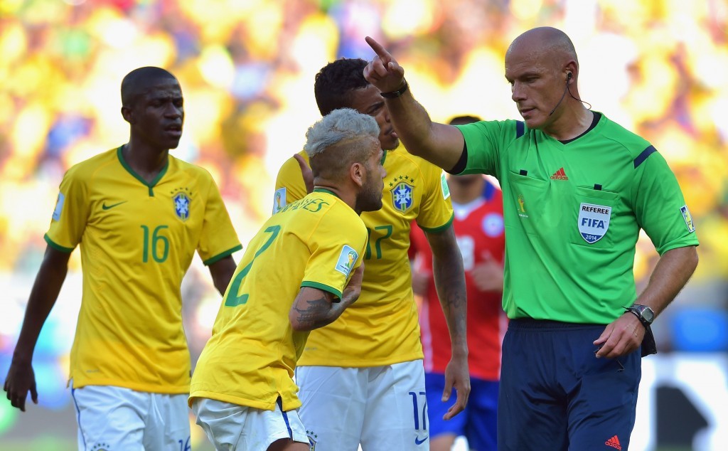 Howard Webb takes charge at the 2014 World Cup (Buda Mendes/Getty Images)