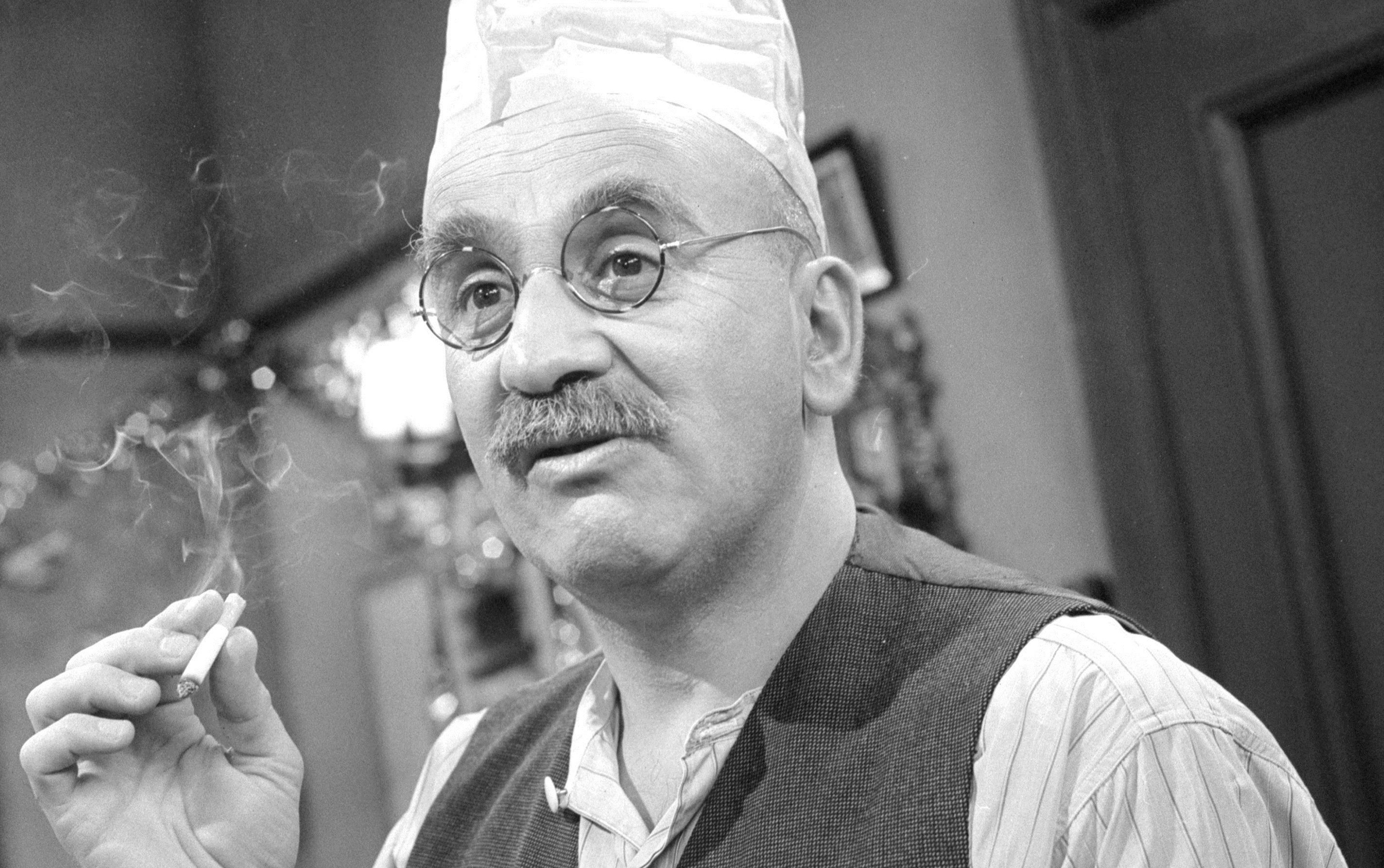 Warren Mitchell as Alf Garnett (PA/PA Wire)