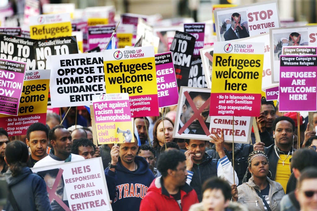 Campaigners from Stand Up to Racism protest through Glasgow City Centre (Danny Lawson/PA Wire)