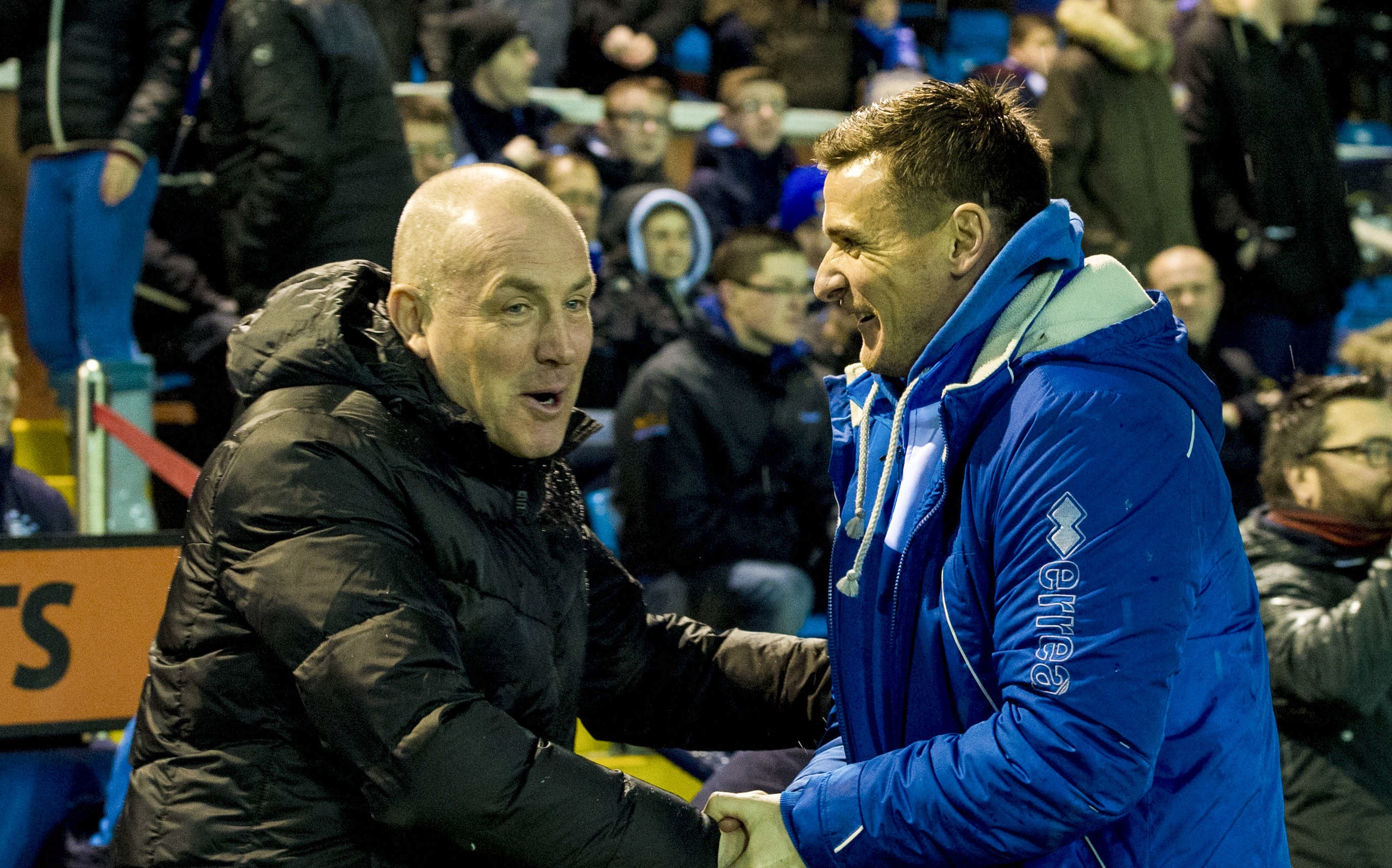 Rangers Manager Mark Warburton (left) shakes hands with Kilmarnock Assistant Lee McCulloch (SNS Group)