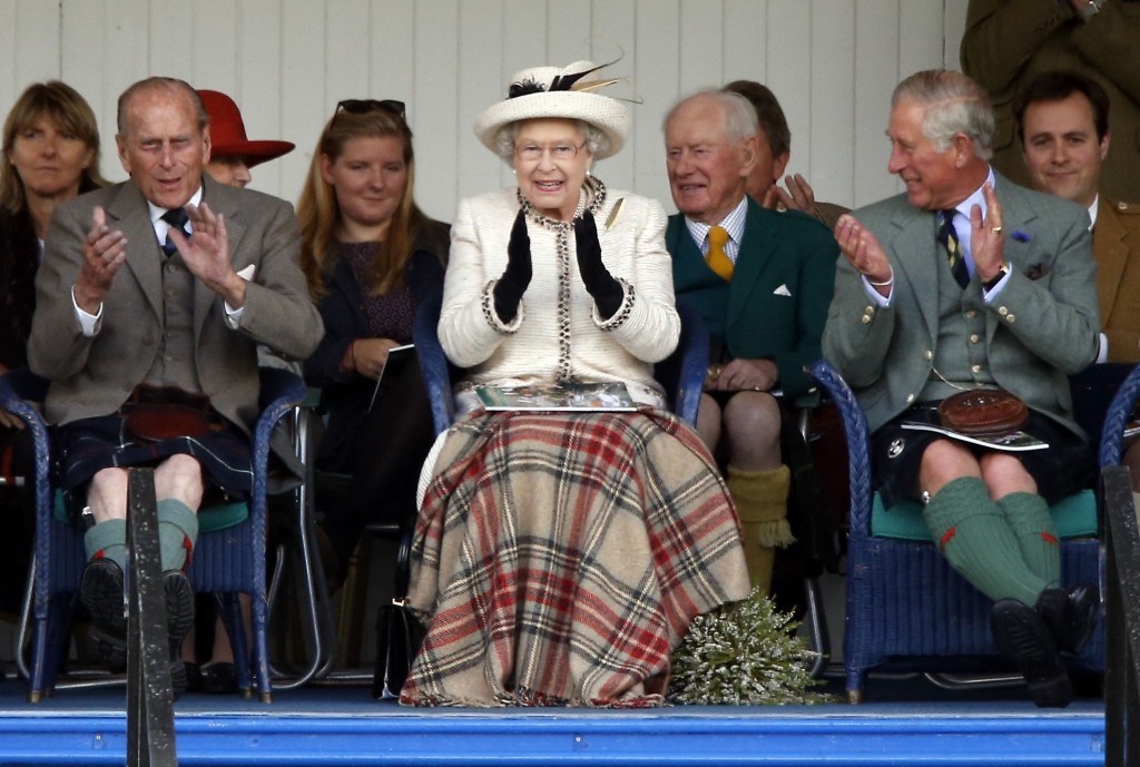 2014: Queen Elizabeth II, the Duke of Edinburgh and Prince of Wales attend the Braemar Royal Highland Gathering (Pic: PA Archive)