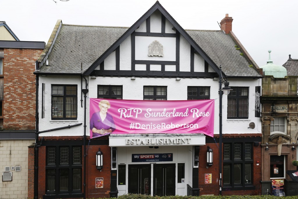 A pink banner on the Establishment pub next to Sunderland Minster (Owen Humphreys/PA Wire)