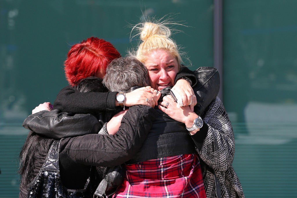 Relatives of Hillsborough victims hug as they depart Birchwood Park after hearing the conclusions of the Hillsborough inquest (Dave Thompson/Getty Images)