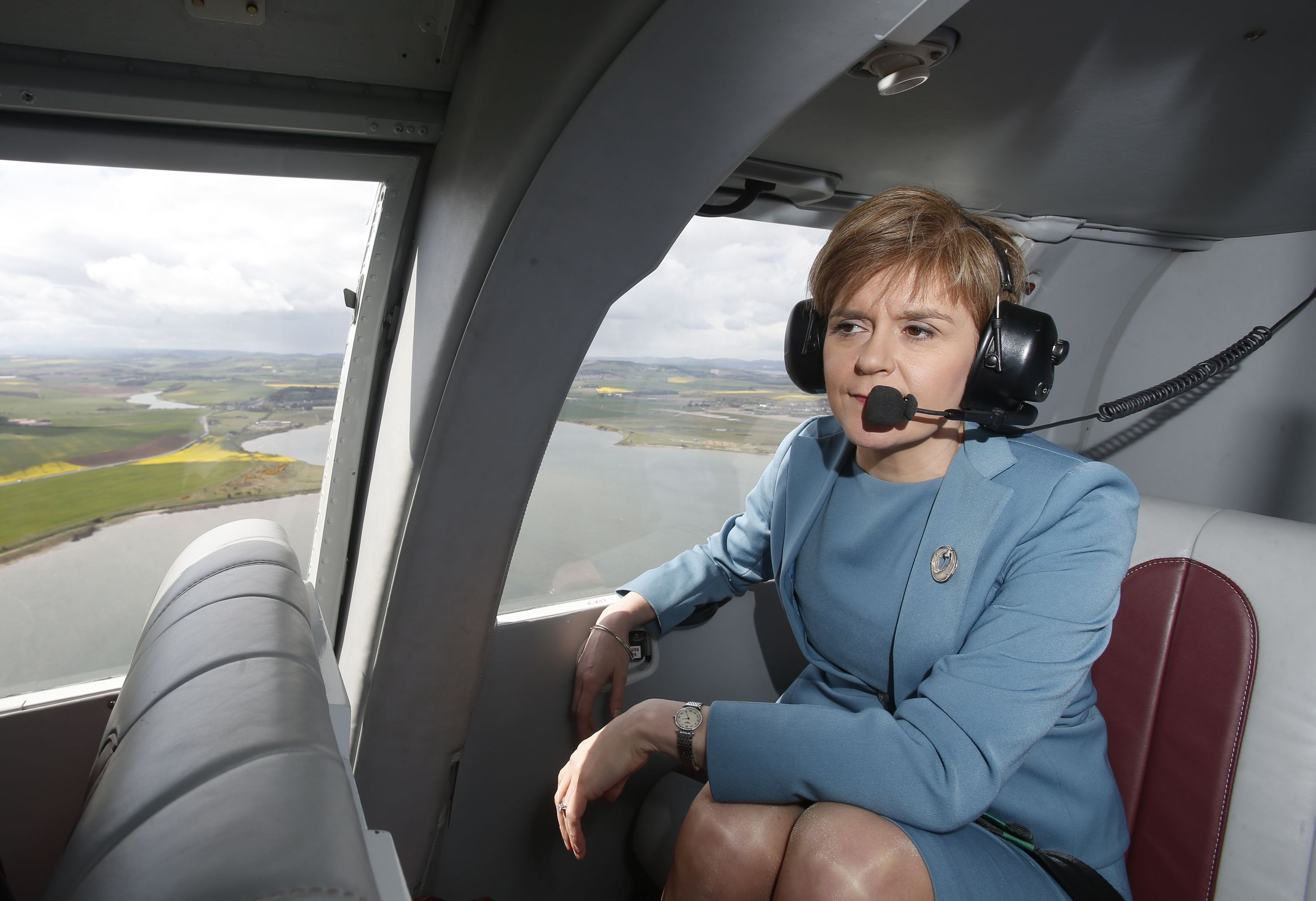 First Minister Nicola Sturgeon in a helicopter on the General Election campaign trail (Danny Lawson / PA)