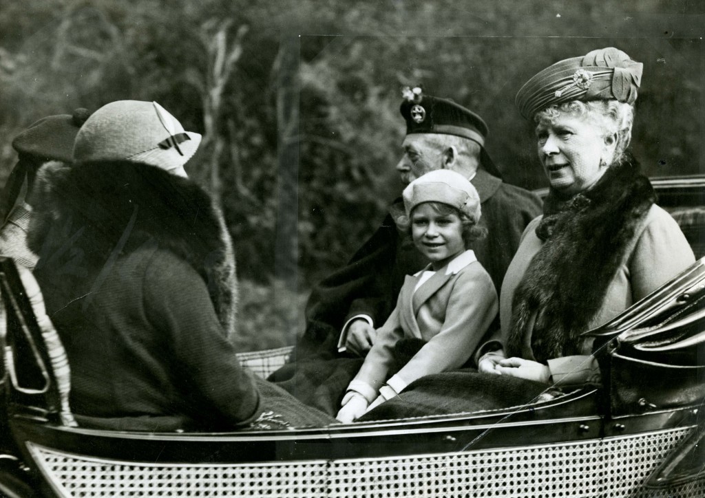 Wrapped up for a Scottish day out with her grandparents, King George V and Queen Mary (DC Thomson)