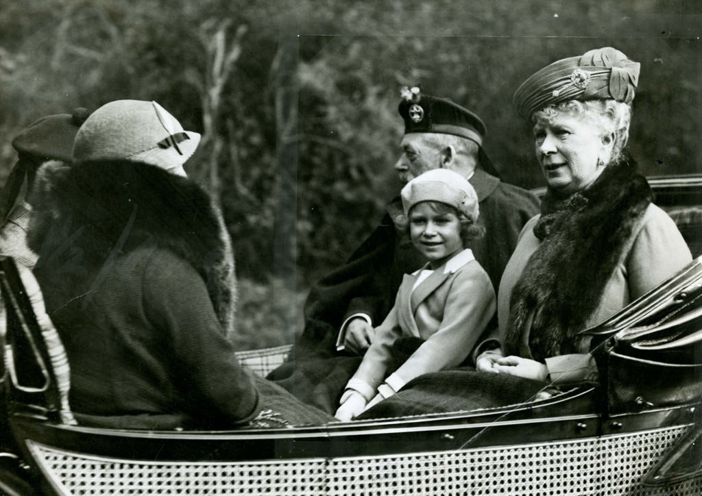 1932: A young Elizabeth Wrapped up for a Scottish day out with her grandparents, King George V and Queen Mary (Pic: DC Thomson)