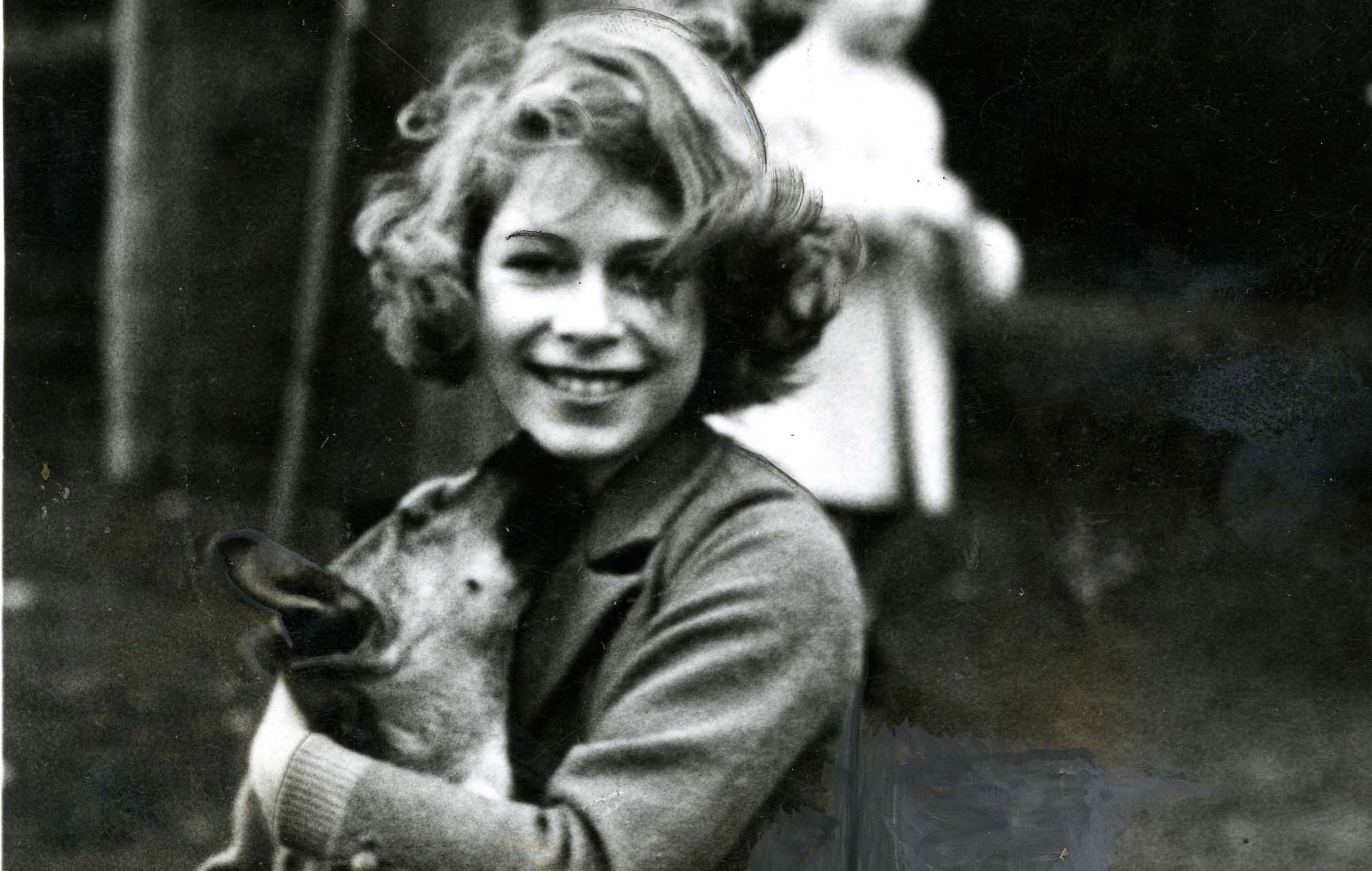 The Queen would become well known for her love of dogs, and as this picture of her aged 12 at Glamis shows, she has been a fan since childhood.