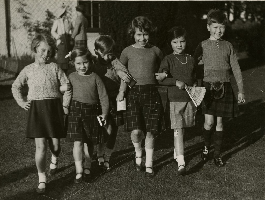 Already showing leadership qualities, the young Princess Elizabeth (centre) takes charge of childhood friends at Elsick House, Newtonhill, near Stonehaven, in 1935 (AJL)