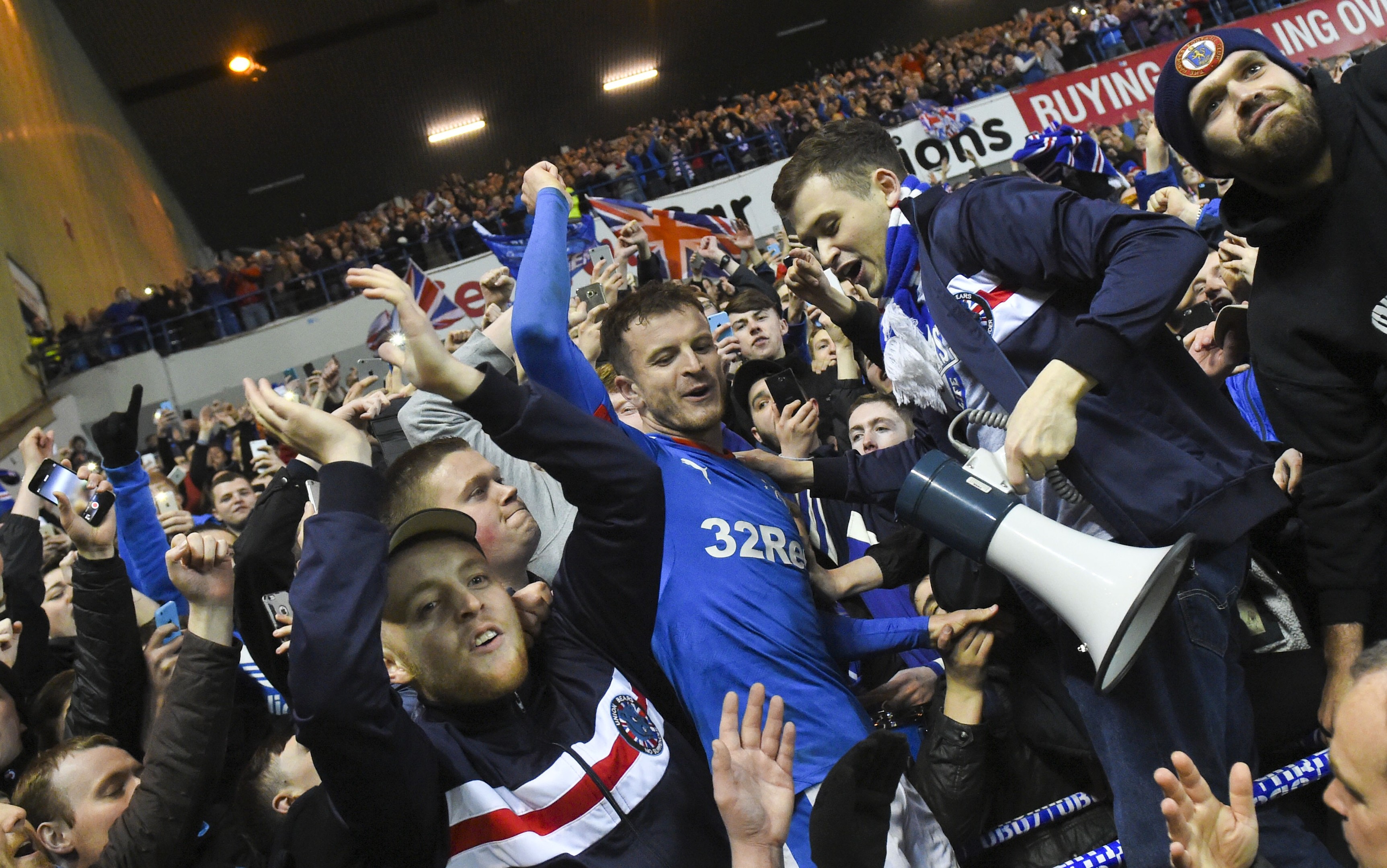 Rangers' Andy Halliday celebrates with the fans at full-time (SNS Group / Craig Foy)