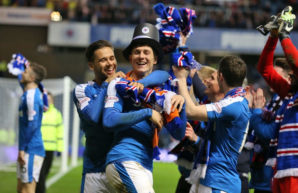 Rangers' Rob Kiernan (centre) and Harry Forrester (left) celebrate (Andrew Milligan/PA Wire)