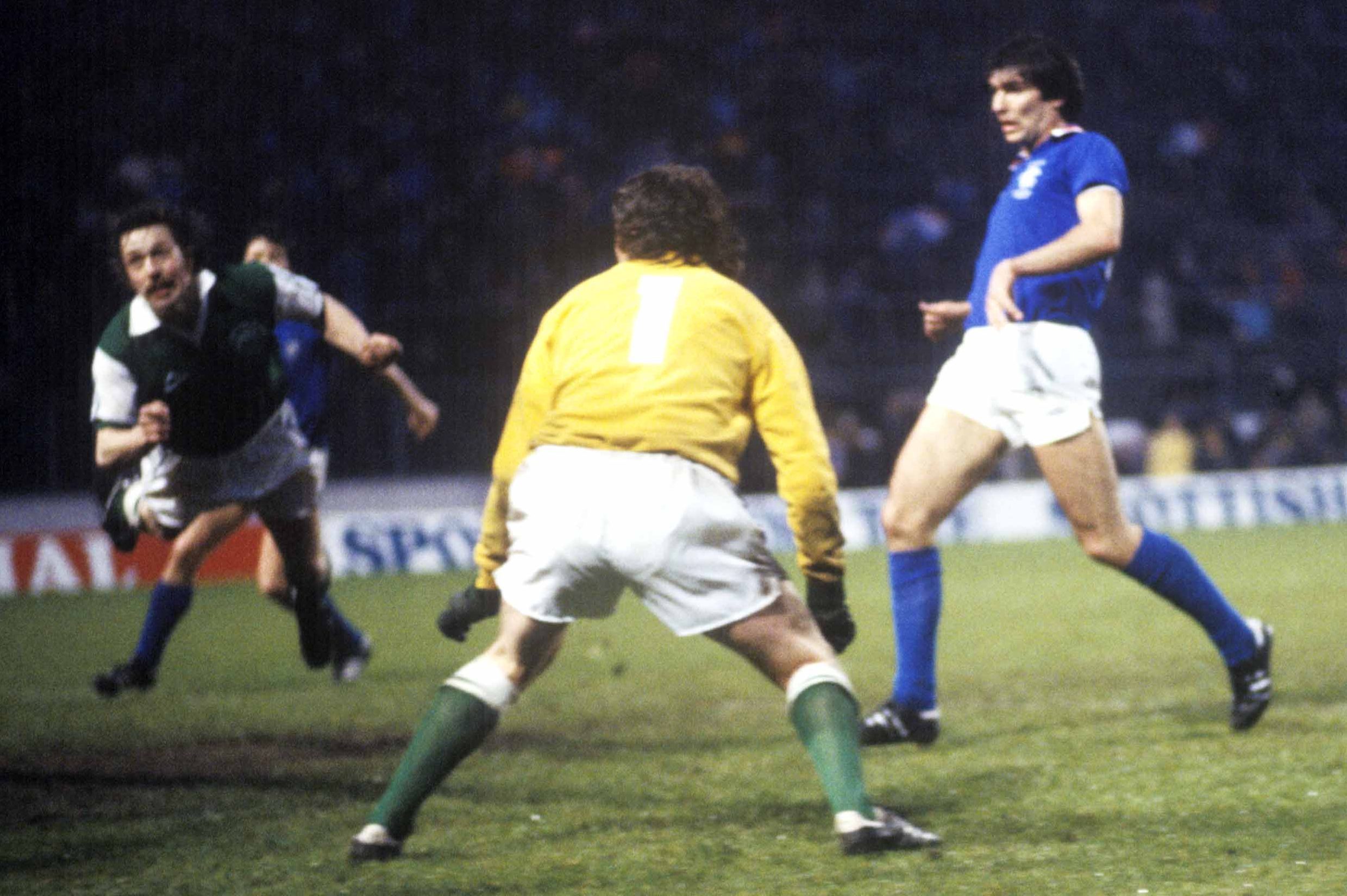 Hibs defender Arthur Duncan (left) inadvertenly heads the ball past goalkeeper Jim McArthur as Rangers striker Gordon Smith looks on, Scottish Cup final replay, 1979