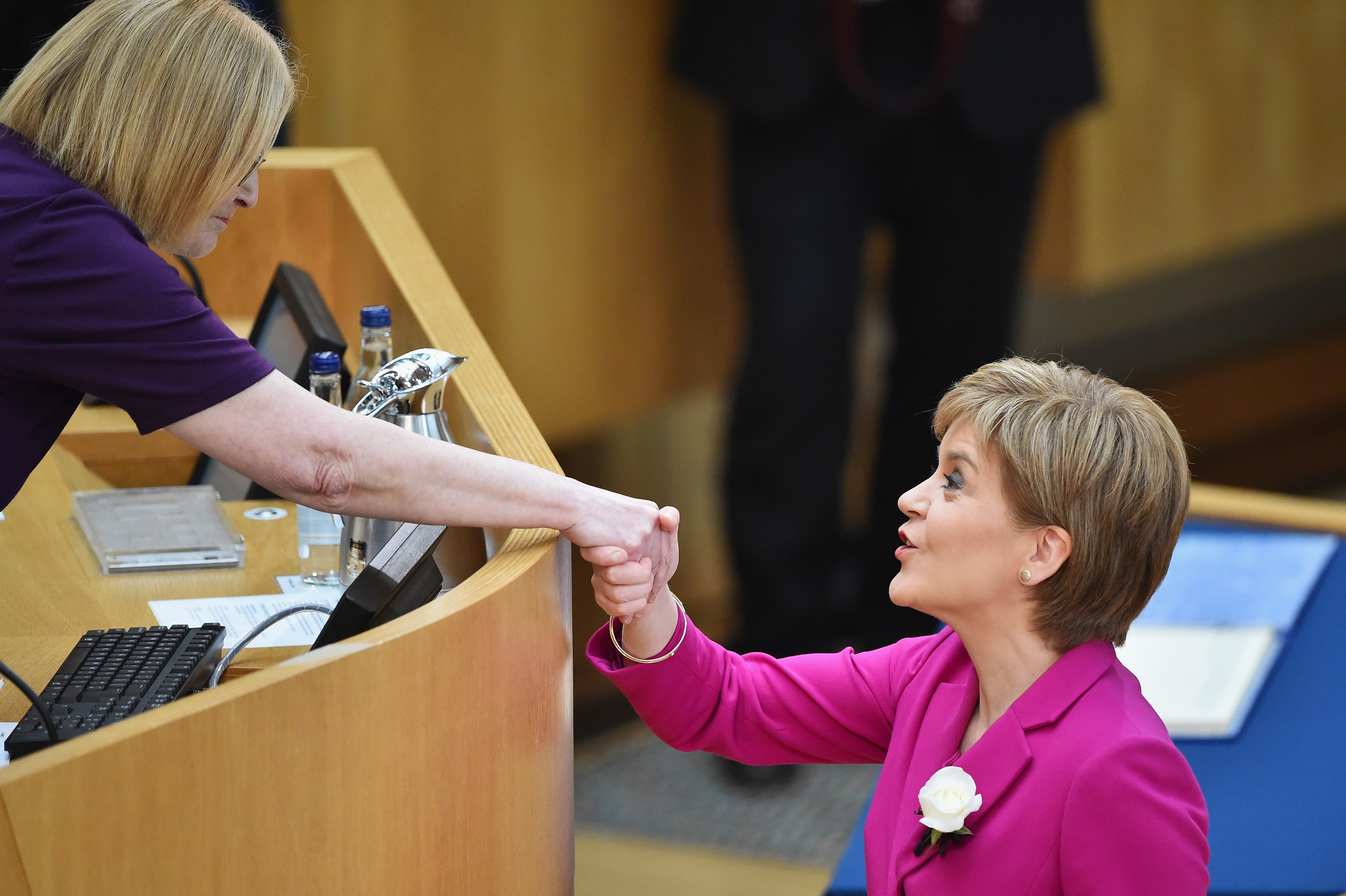 Nicola Sturgeon shakes hands with Presiding Officer Tricia Marwick (Jeff J Mitchell/Getty Images)