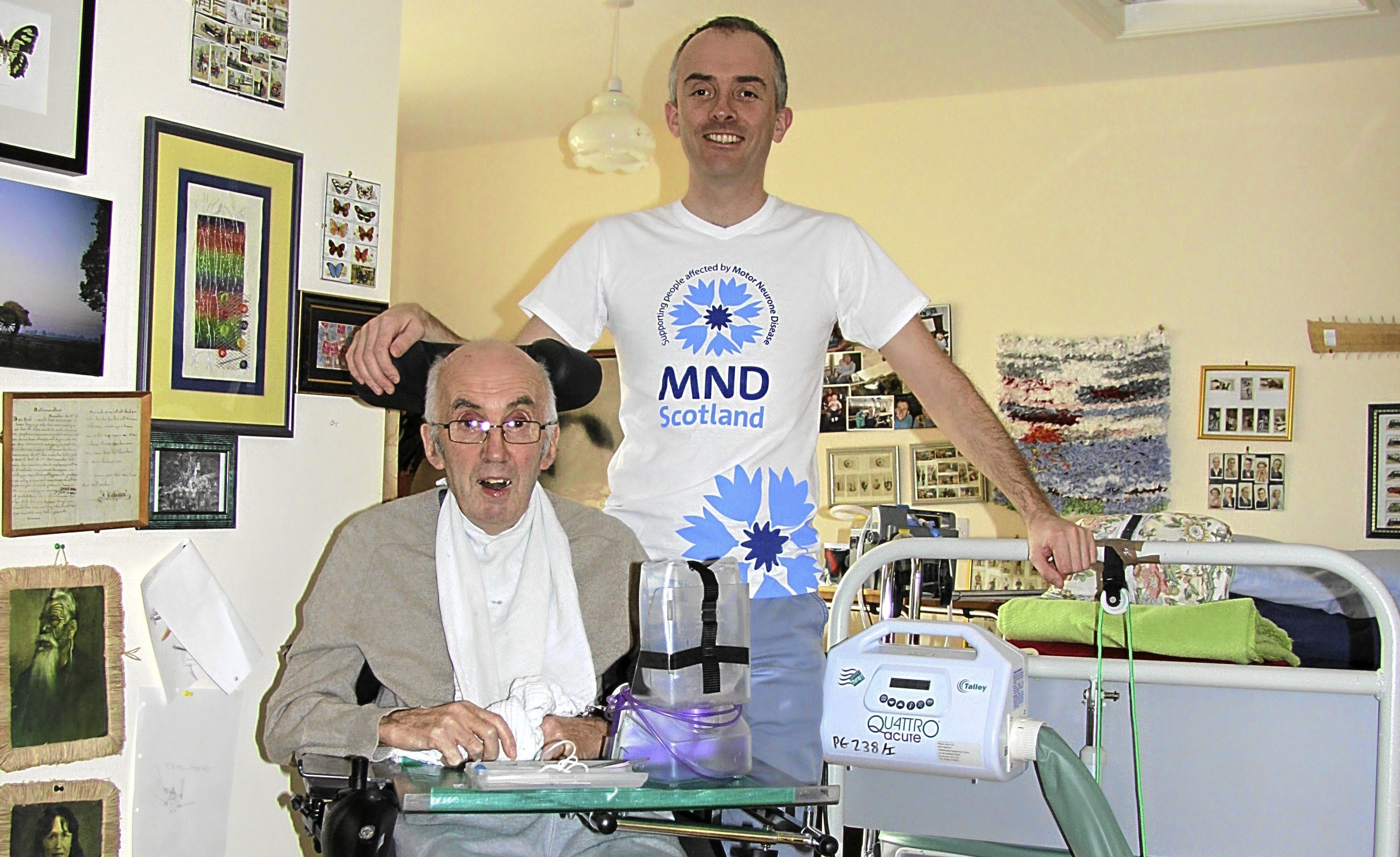 Dad Michael Laycock (sitting) and son Jamie