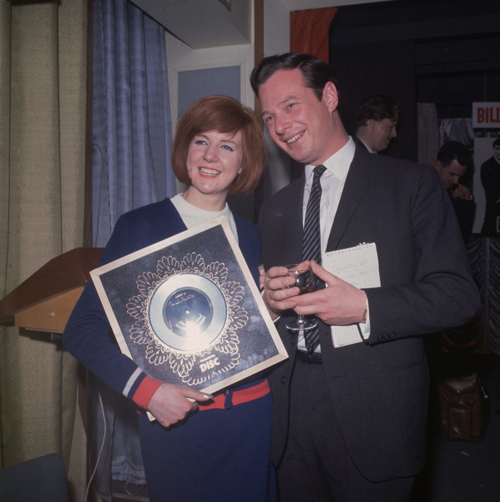 Cilla Black with manager and promoter Brian Epstein and the Silver Disc for 'Anyone who had a Heart' (Hulton Archive/Getty Images)