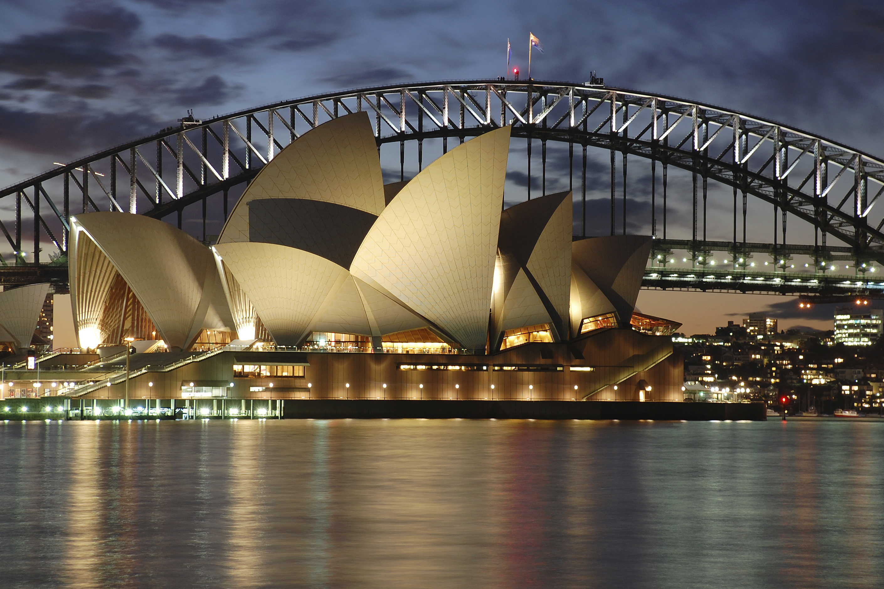 Sydney Opera House with Harbour Bridge at night (Getty Images)