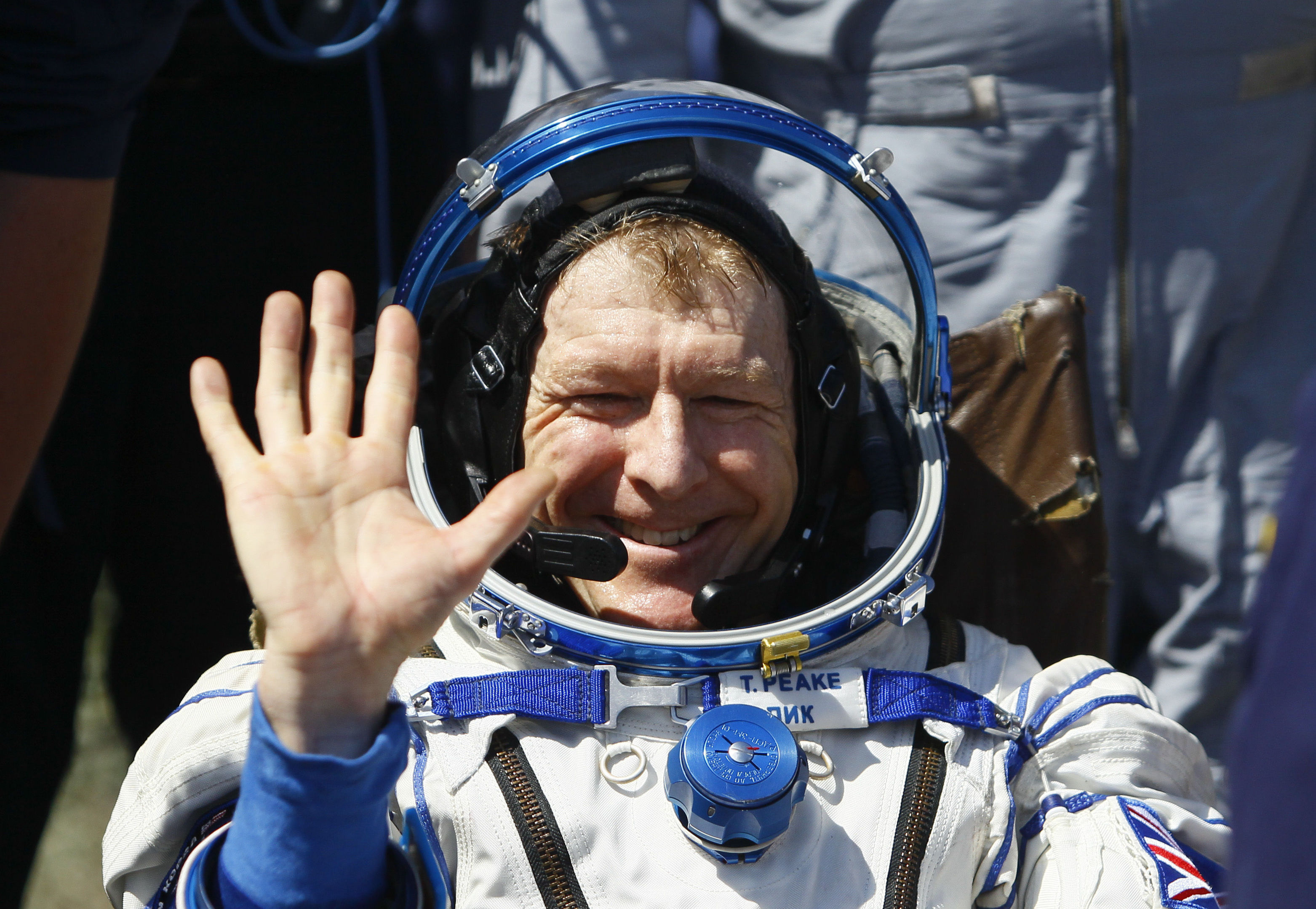 Member of the International Space Station (ISS) crew Britain's Tim Peake waves after landing near the town of Dzhezkazgan, Kazakhstan (Shamil Zhumatov/Pool Photo via AP)