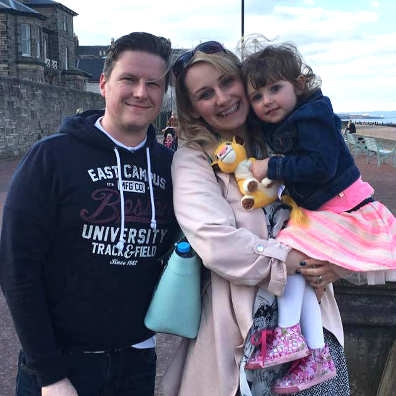Laura Beveridge with her husband Steven and daughter Maia