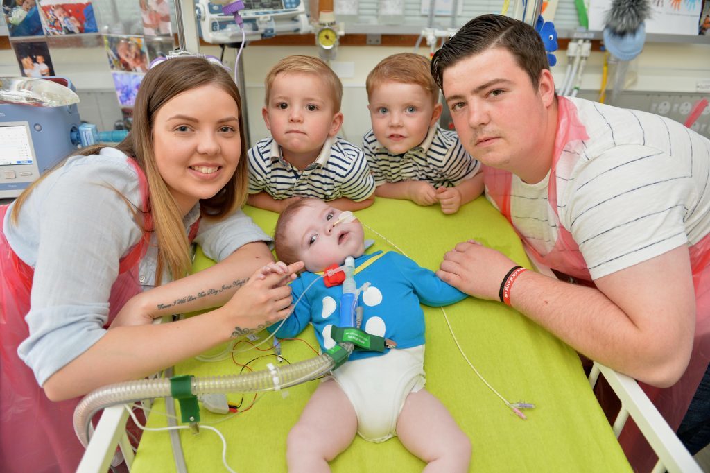 Ten month-old Lennox Smith is watched over by his family (Paul Vicente / The Sunday Post)