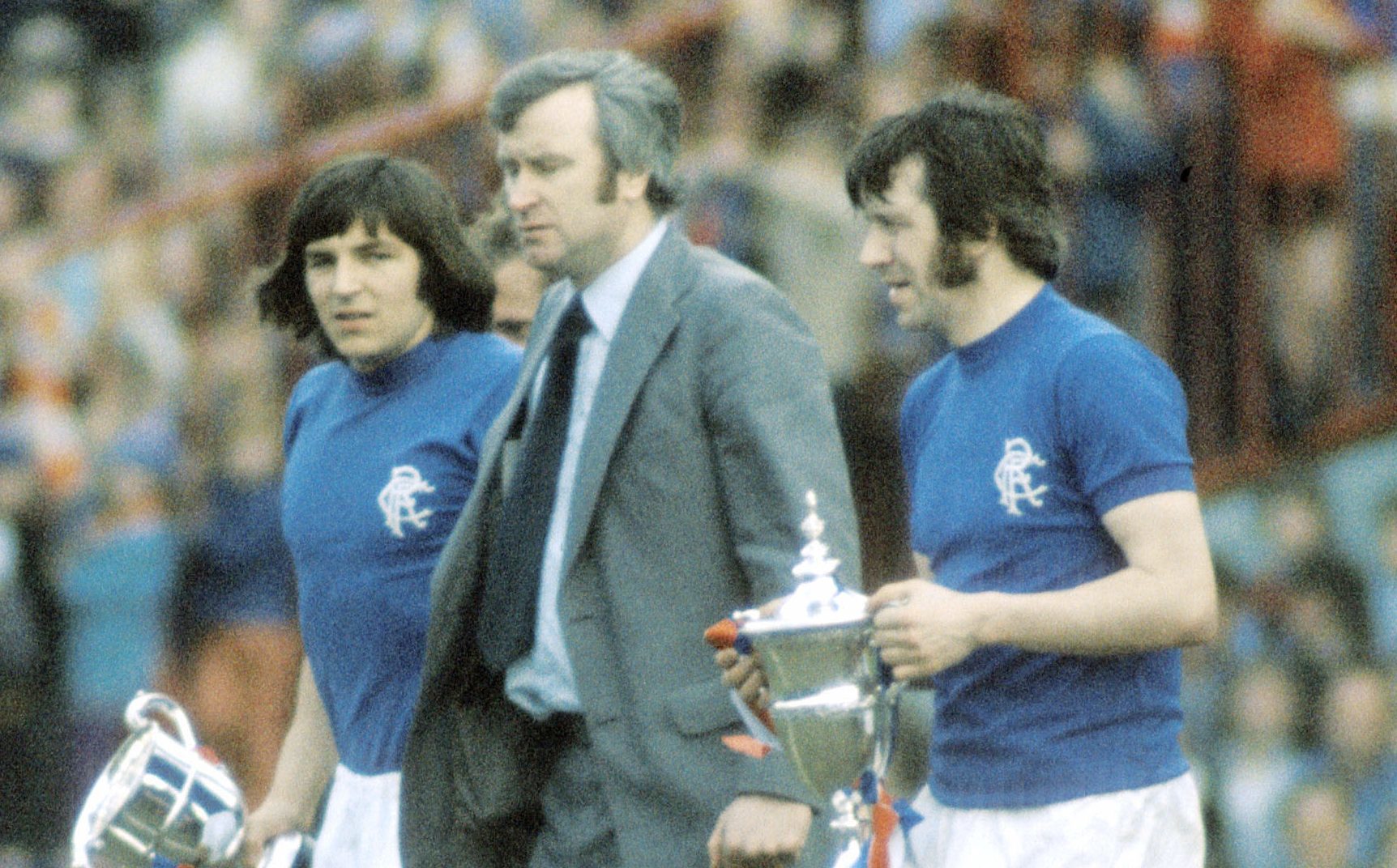 Rangers' John Hamilton (left) with the Reserve League trophy beside manager Jock Wallace and John Greig with the Premier League trophy, 1975 (SNS Group)