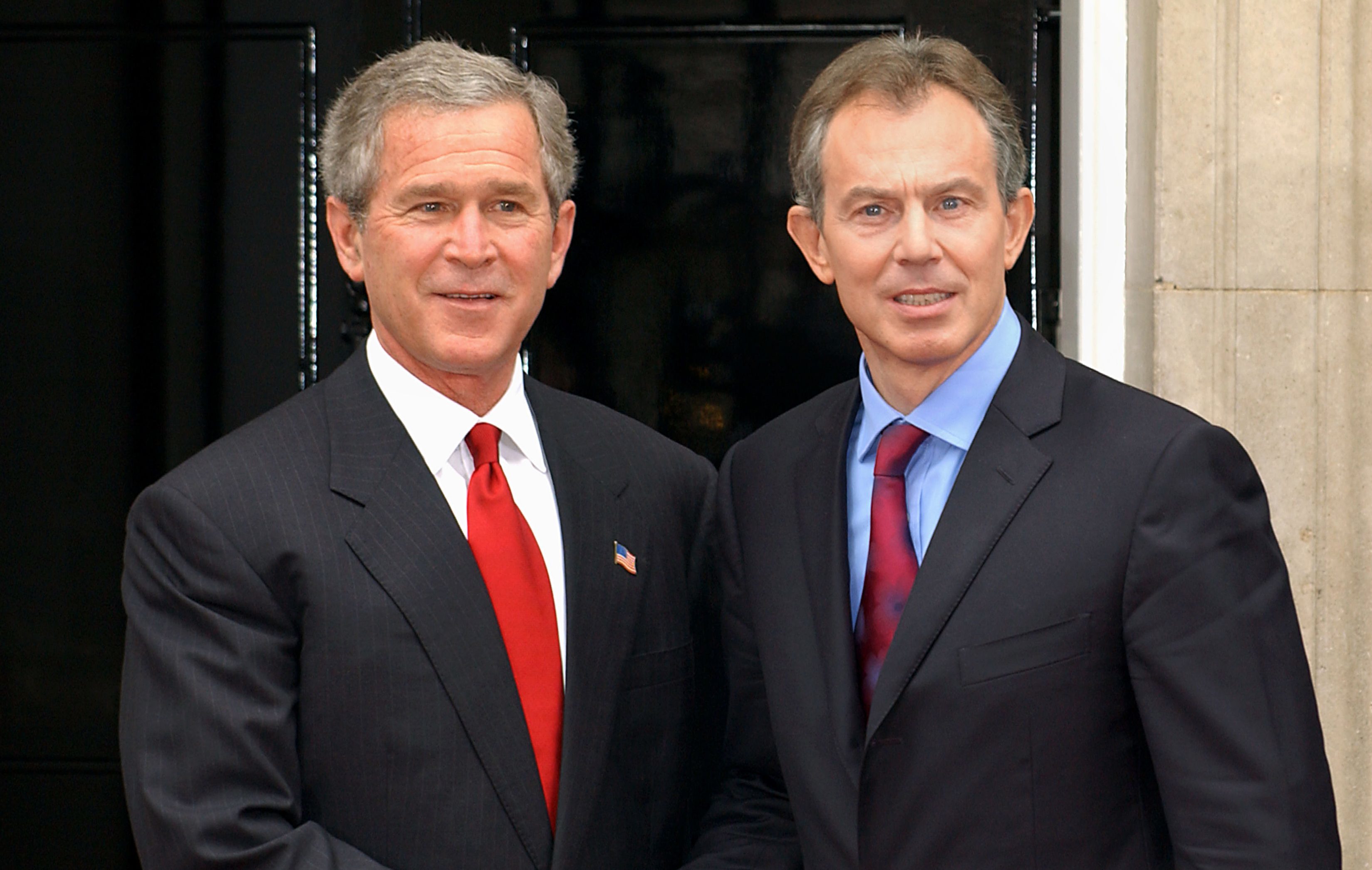 Tony Blair (right) alongside former US President George Bush (Fiona Hanson/PA)