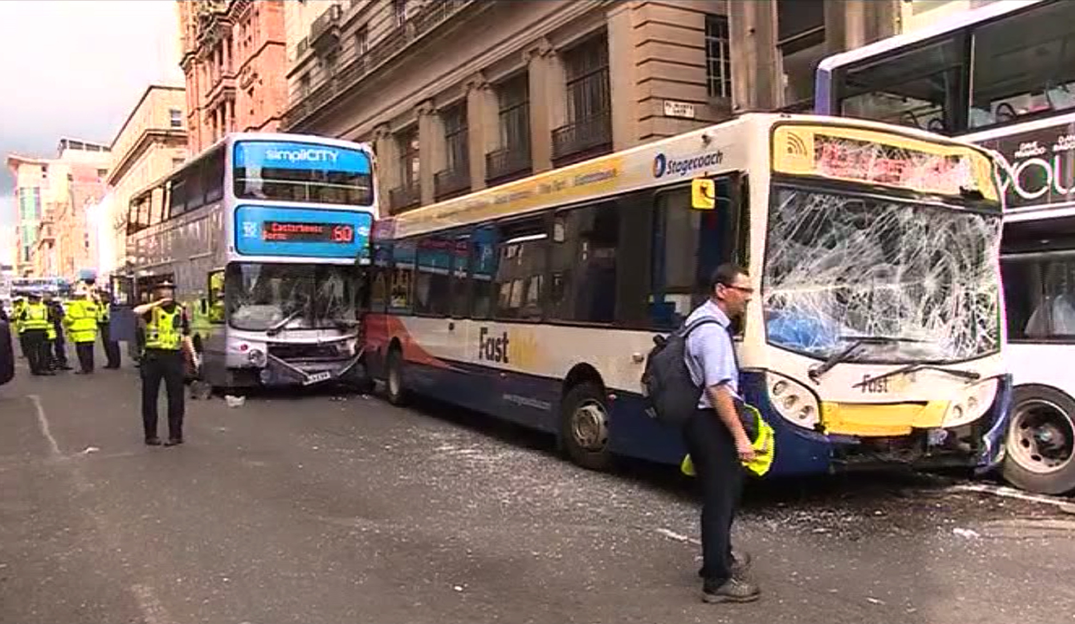 Male pedestrian hit by 'runaway' bus in Glasgow city centre (Universal News And Sport)