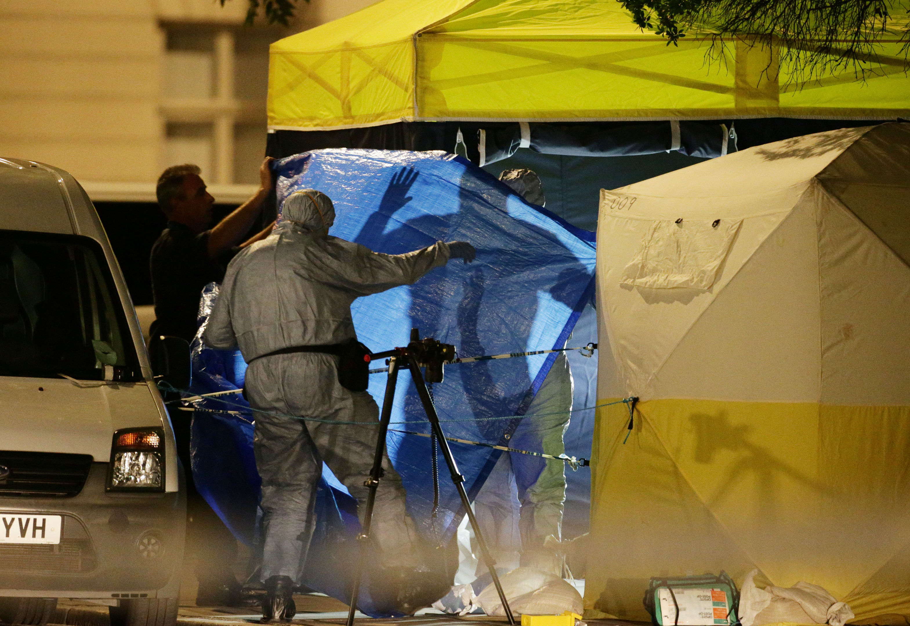 Police forensic officers at work in Russell Square (PA)