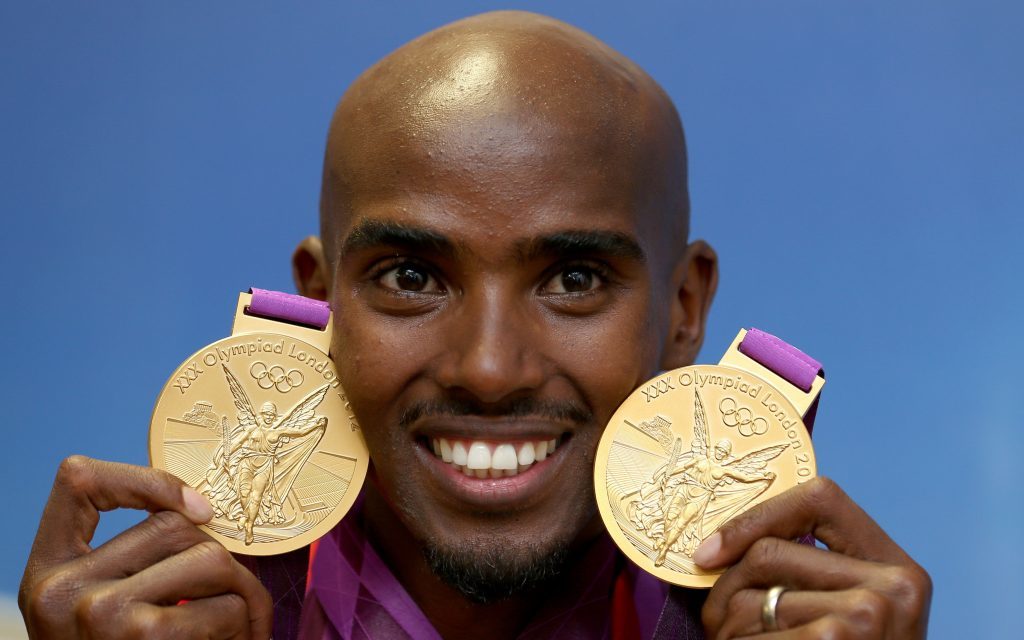 Mo Farah with his 2 Olympic gold medals (PA Archive)