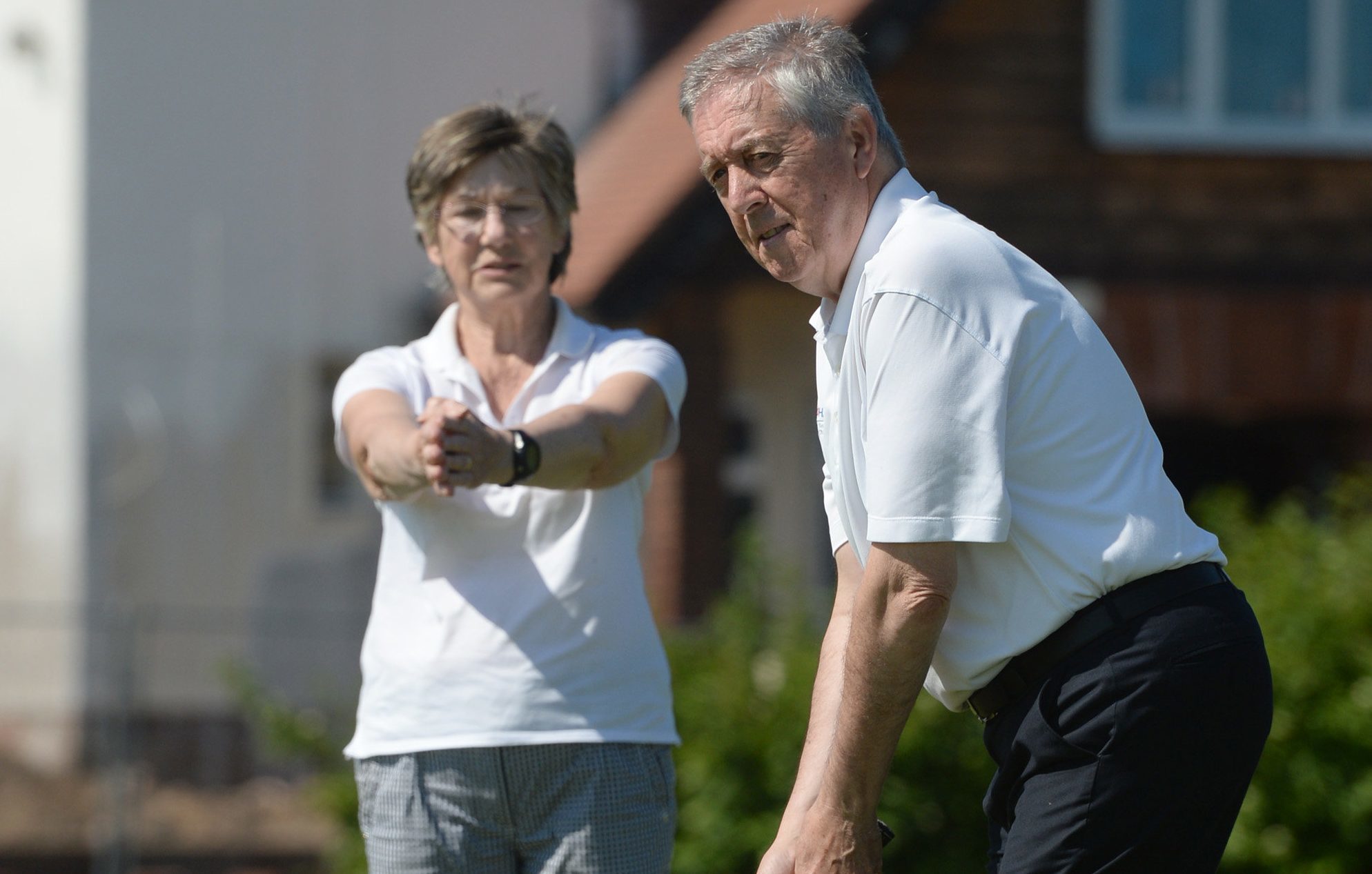 Blind golfer Gerry Kelly and his wife, caddie and guide Mary Kelly play some holes at Troon Welbeck Golf Club (James Chapelard / SWNS)