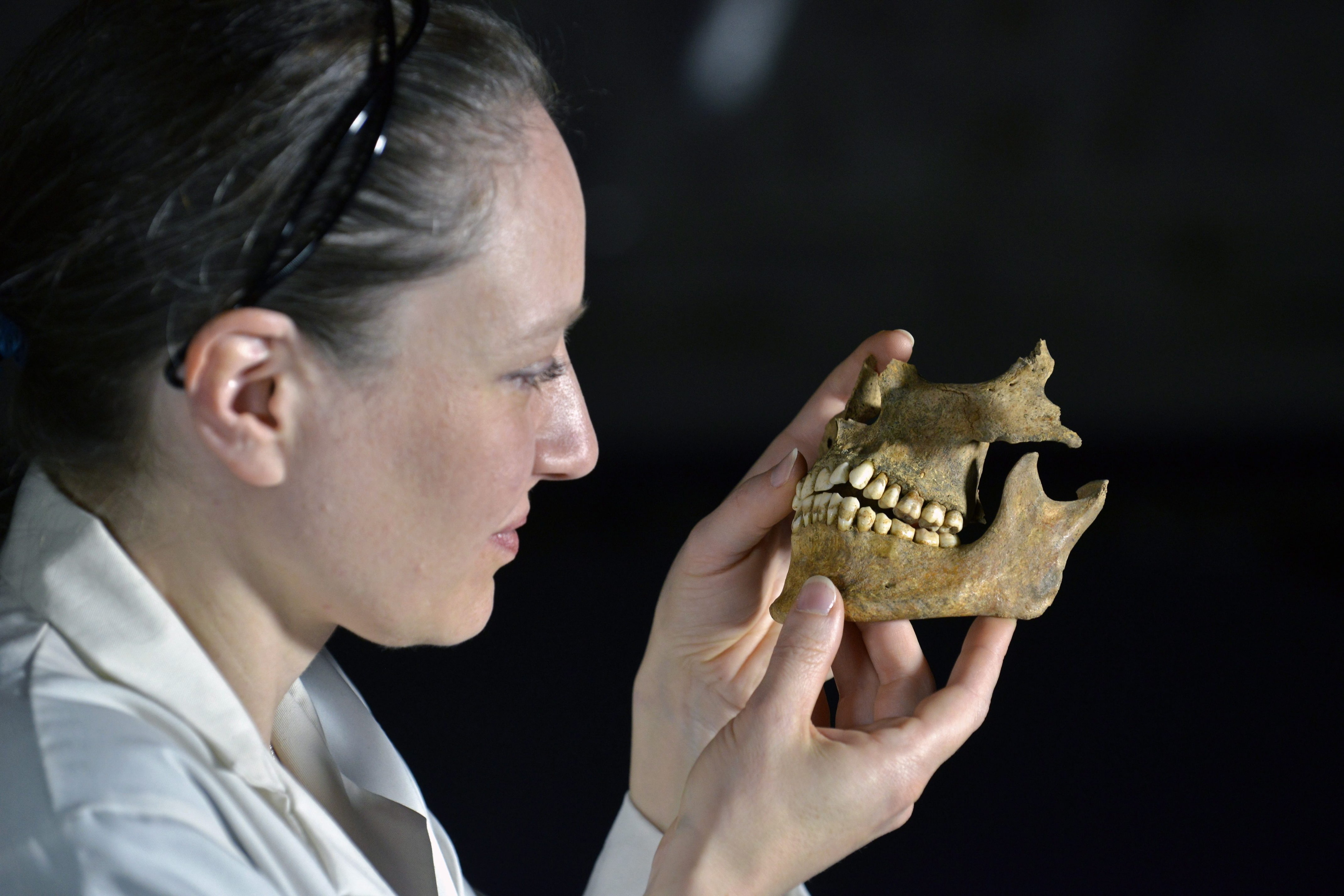 Dr Anwen Caffell of Durham University with some of the remains of a Scottish prisoner of war (Richard Rayner/Durham University/PA Wire)