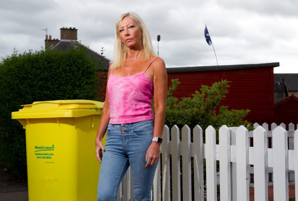 Elaine Moir, who pays for a private company to take away her bins, because her husband, who has dementia, was not putting things correctly in the recycle bins, and getting her into trouble with the council (Andrew Cawley/Sunday Post)