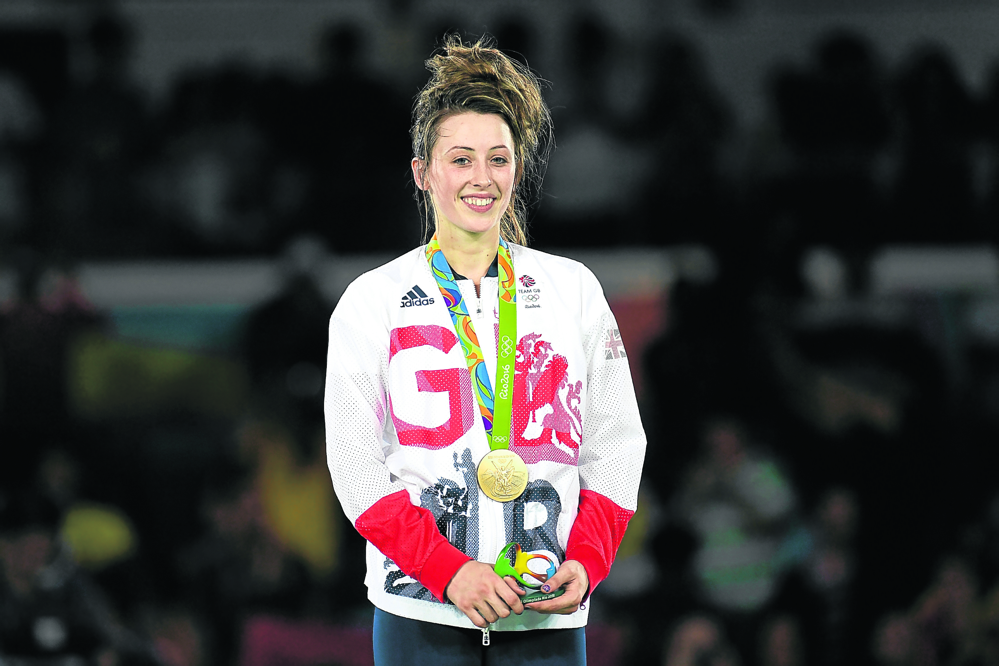 Gold medallist, Jade Jones of Great Britain celebrates after defeating Eva Calvo Gomez of Spain during the Women's -57kg Gold Medal Taekwondo contest (Photo by Laurence Griffiths/Getty Images)