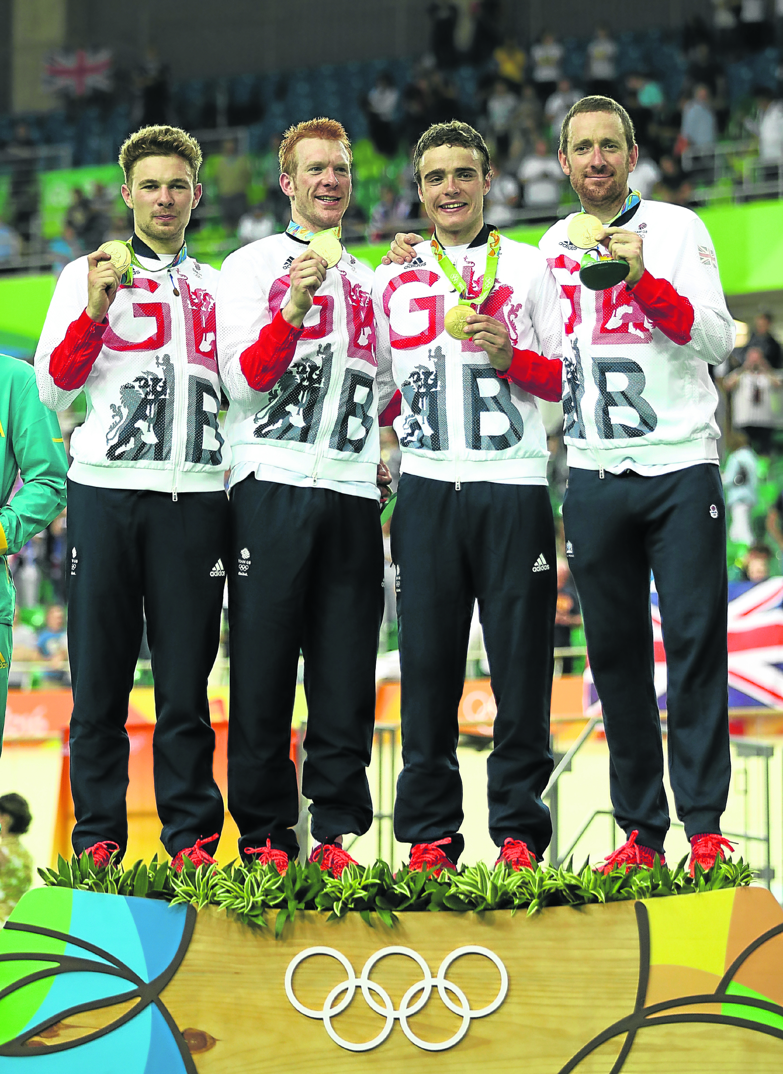 Gold medallists Owain Doull, Edward Clancy, Steven Burke and Bradley Wiggins of Team Great Britain pose for photographs (Photo by Bryn Lennon/Getty Images)