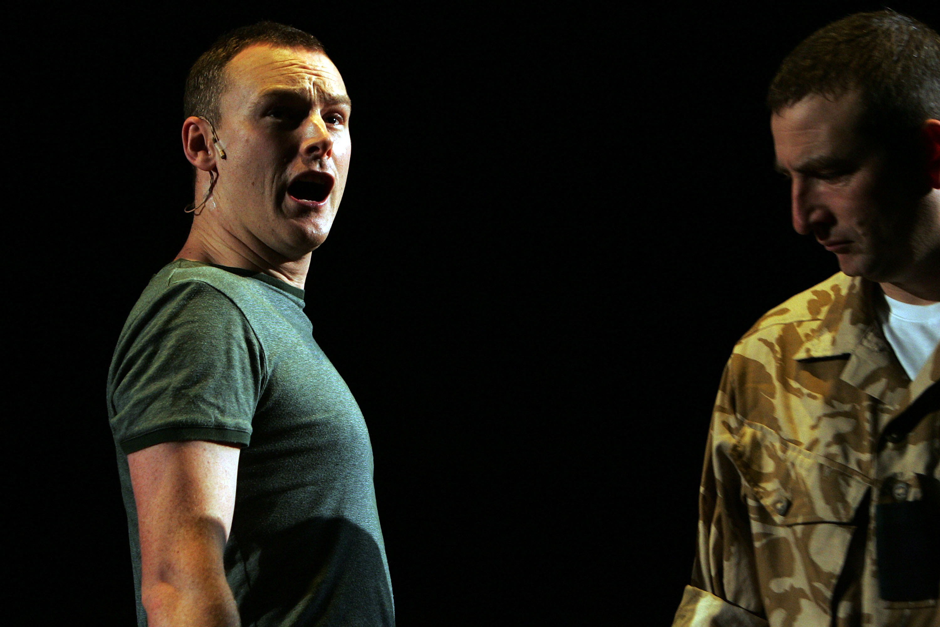 Cast members from the National Theatre of Scotland perform a scene from Black Watch during the 2008 Sydney Festival at the Carriage Works (Lisa Maree Williams/Getty Images)