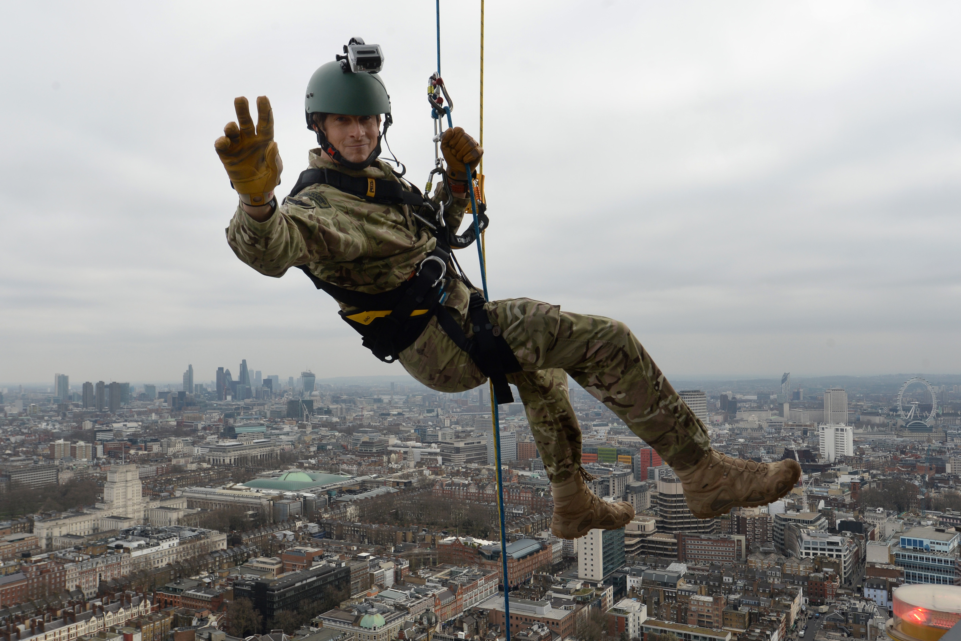 Bear Grylls abseils down the BT Tower in aid of Sport Relief and the Royal Marines Charitable Trust Fund, London.