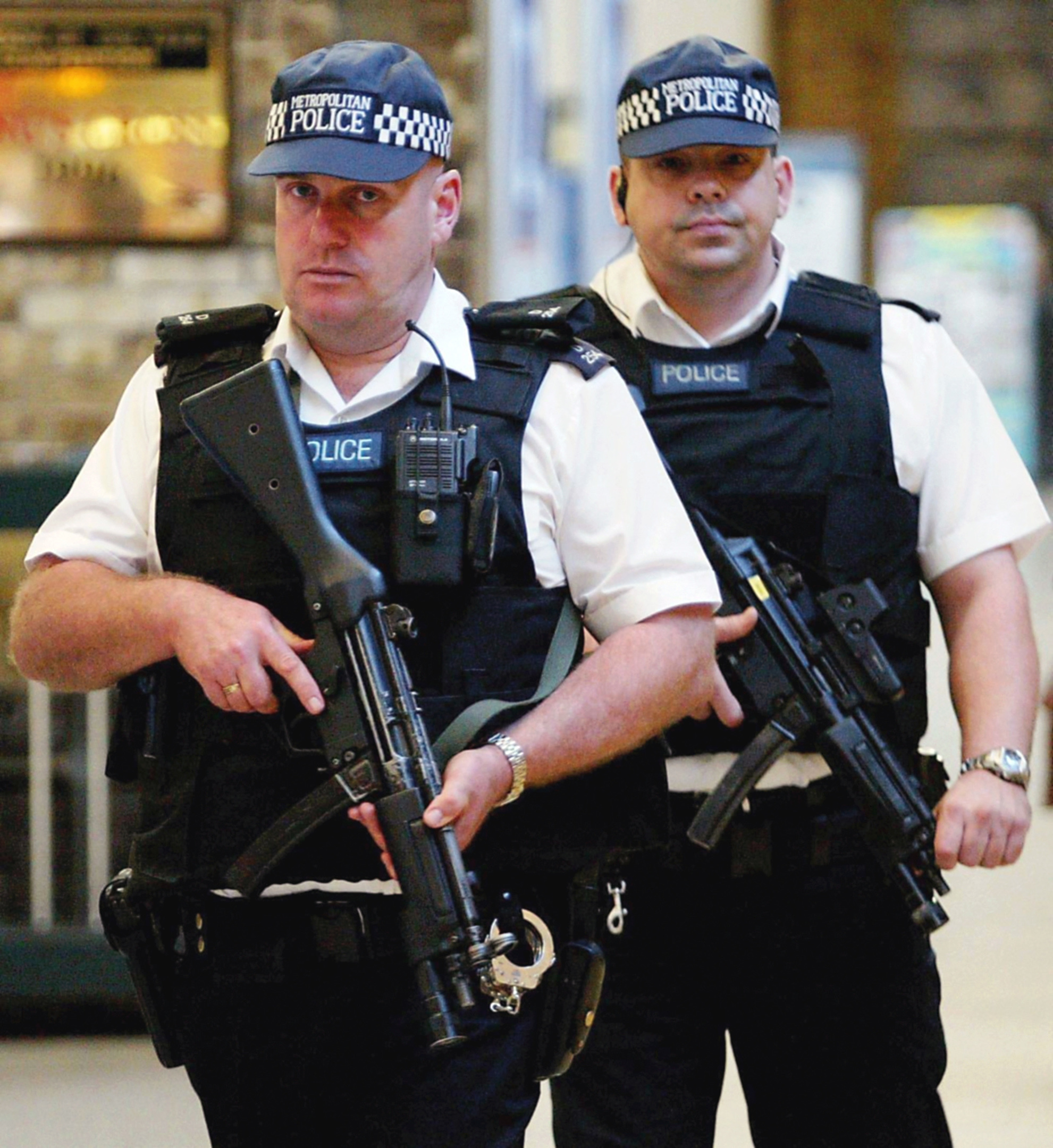 Armed police on patrol at London's Kings Cross Station during London Terrorist Attacks 2005