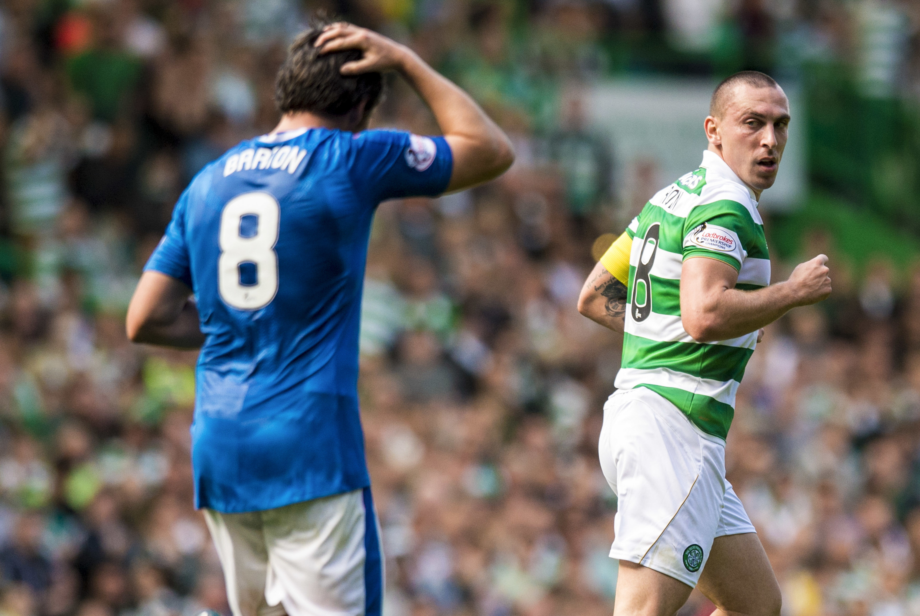 Celtic's Scott Brown (right) with Joey Barton (SNS Group)