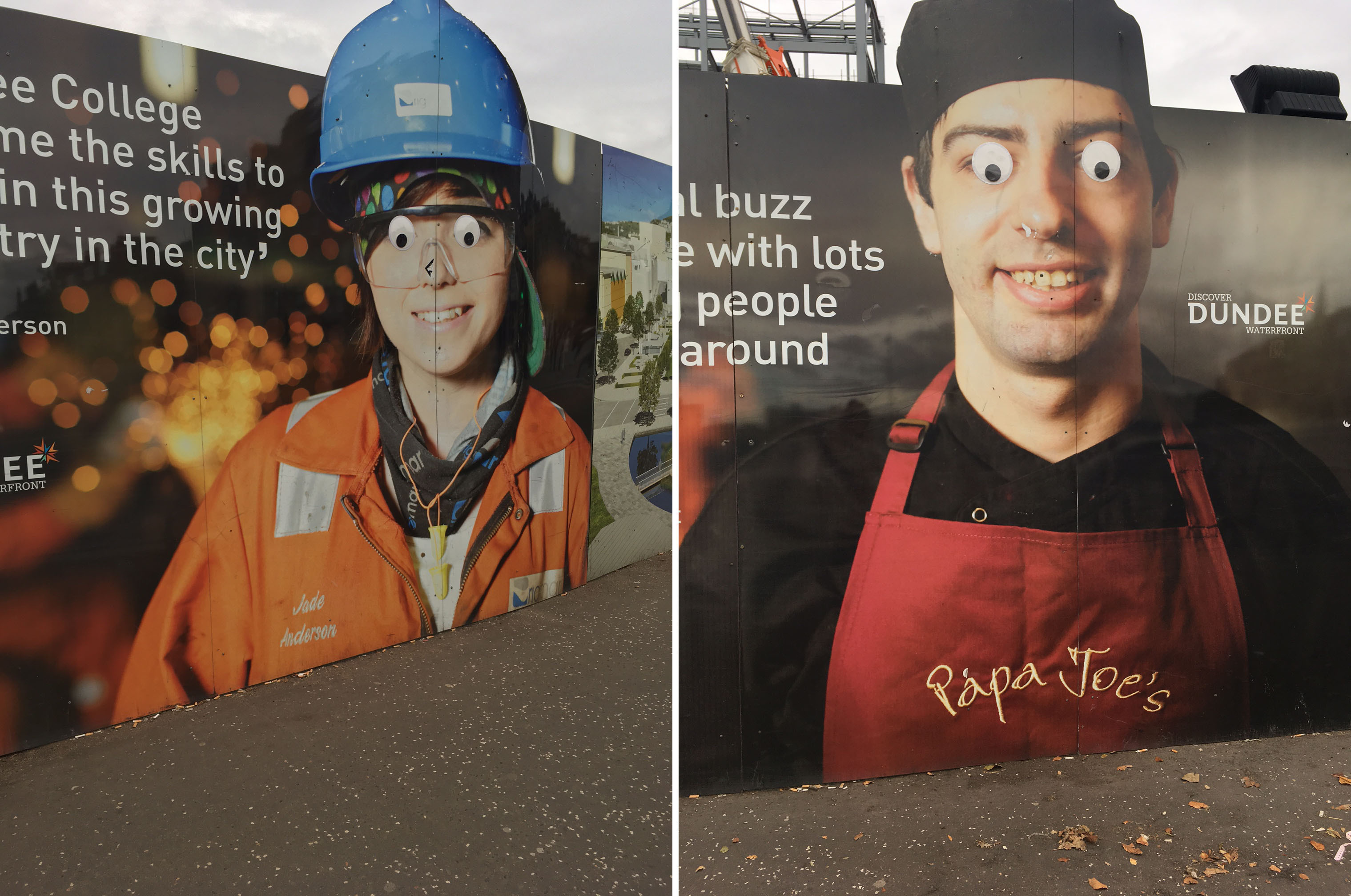 Two billboards surrounding a construction site at Dundee railway station  (Nicola Garrow/PA Wire)
