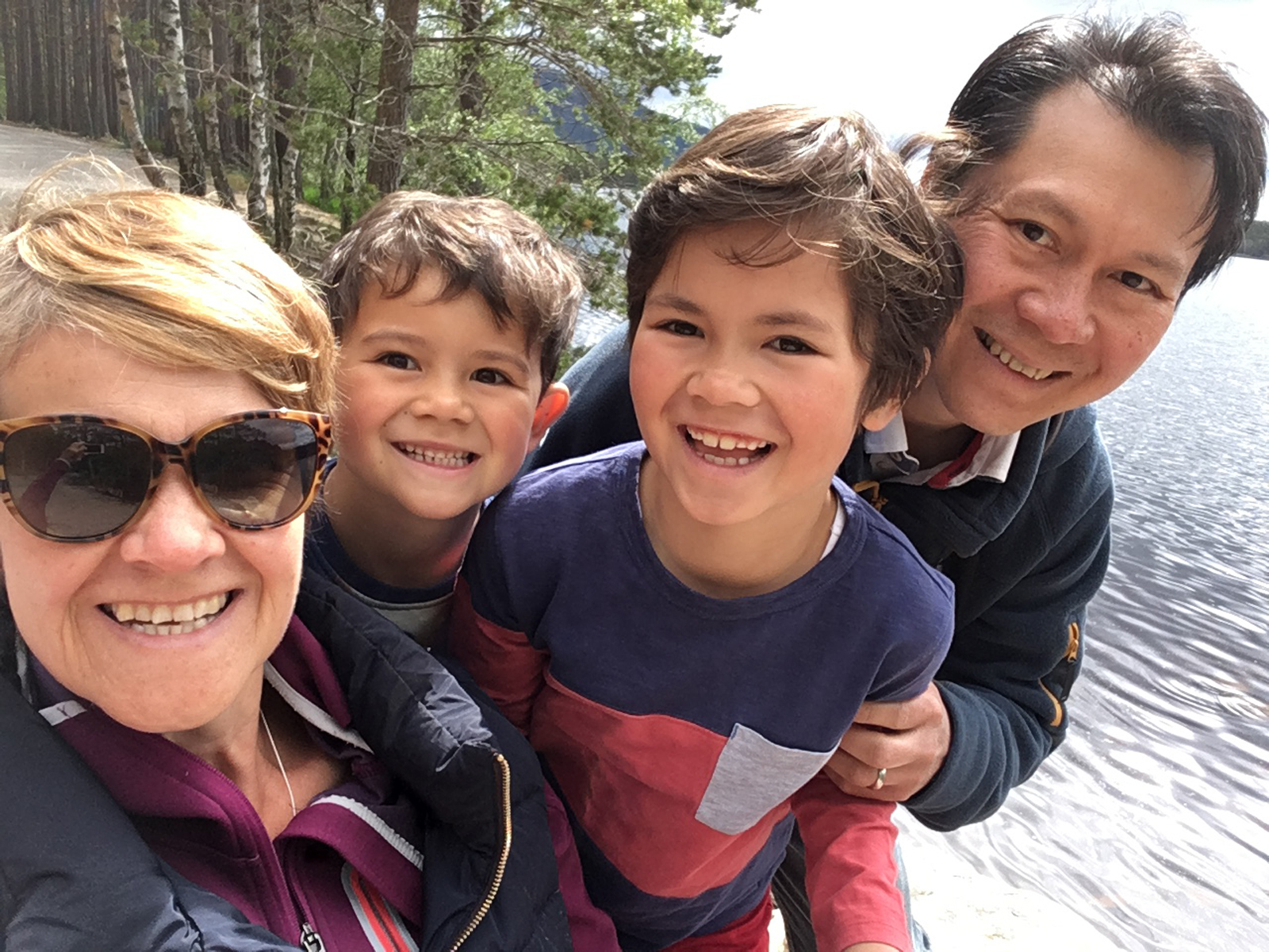 Anne MacLean-Chang is battling cancer for a fourth time - but has been refused a widely hailed breast cancer treatment called Kadcyla on the NHS. L-R Anne, children Ollie, Nathan and husband Winston