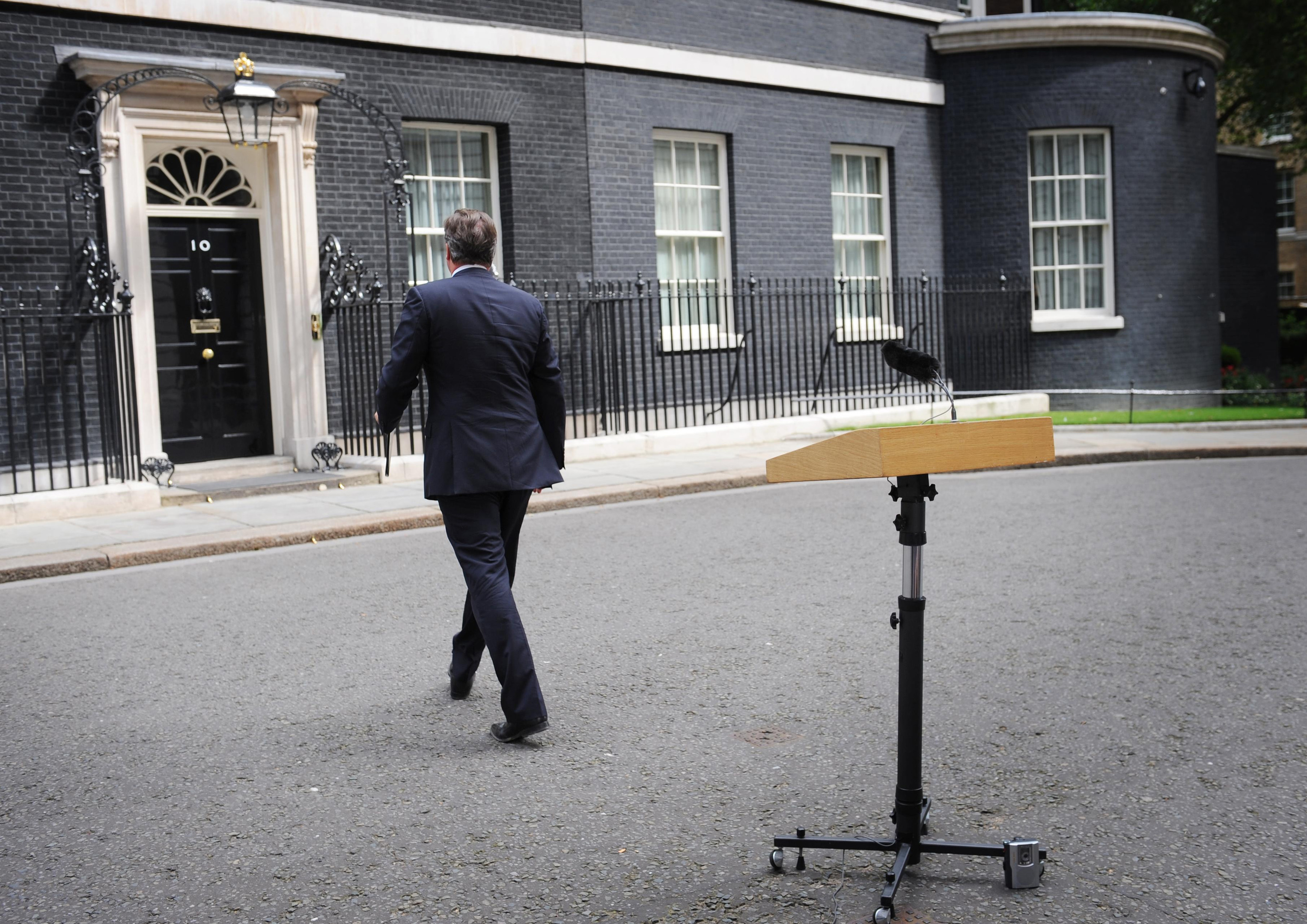 Prime Minister David Cameron leaves (PA)