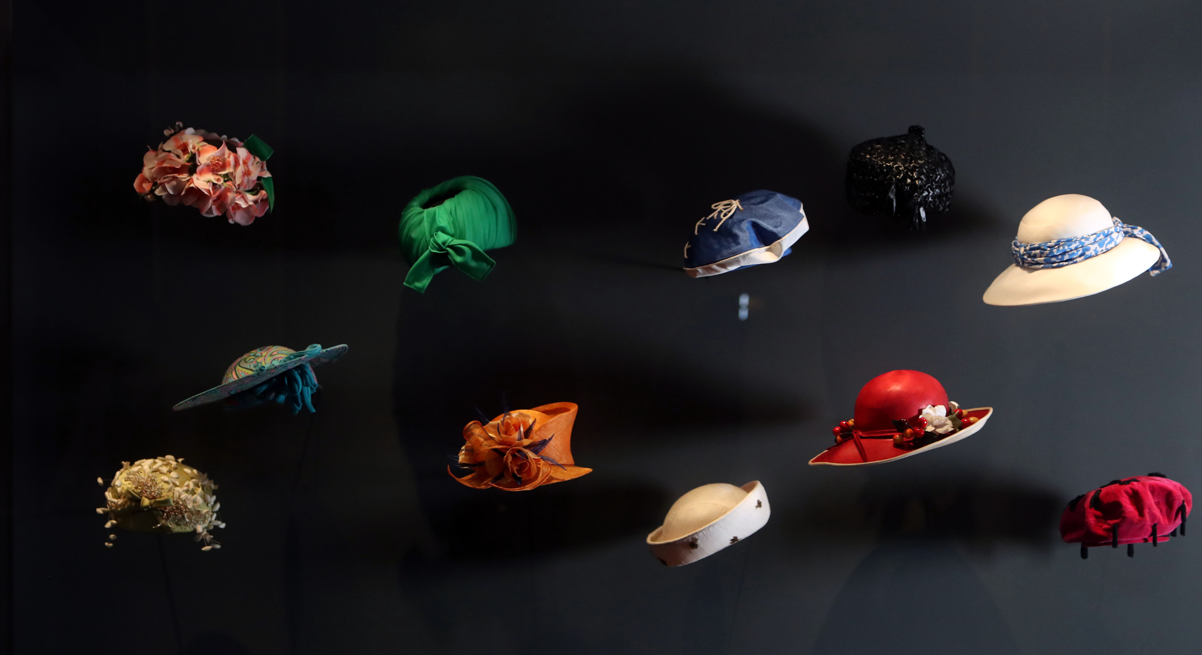 A selection of hats worn by The Queen, during a press preview for Fashioning a Reign: 90 Years of Style from the Queen's Wardrobe, an exhibition at Windsor Castle in Berkshire (Steve Parsons/PA)