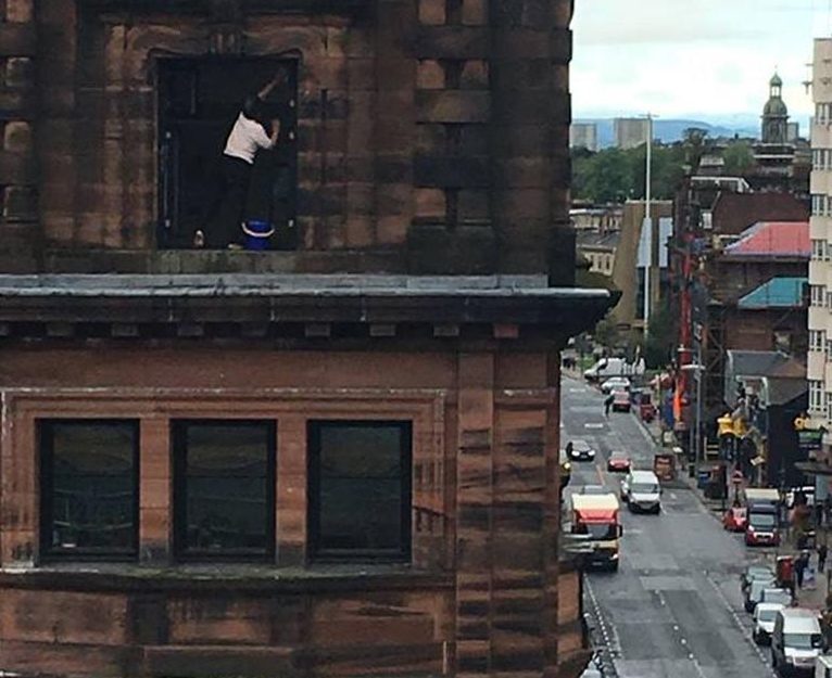 Cleaning windows on Sauchiehall Street (Kieran Turner)