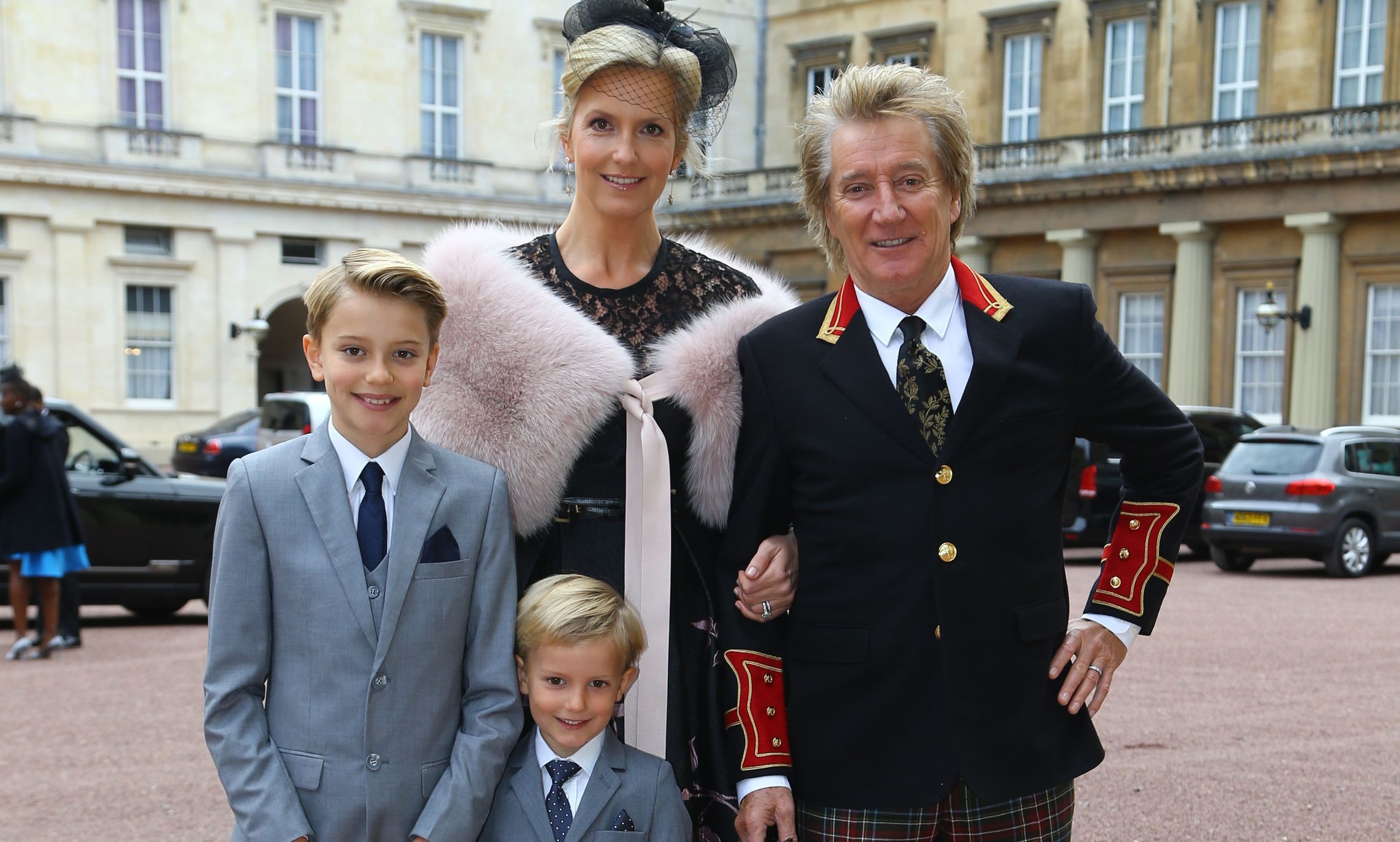 Sir Rod Stewart arriving at Buckingham Palace in London, with his wife, Penny Lancaster and children Alastair and Aiden (Gareth Fulller/PA Wire)