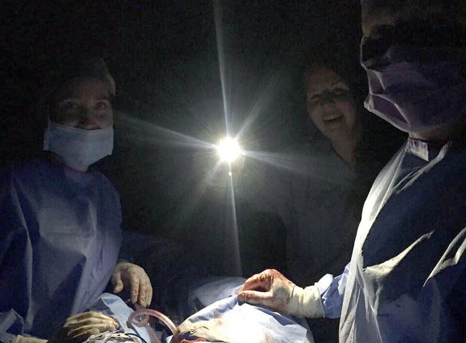 An operation carried out under the light of an iPhone