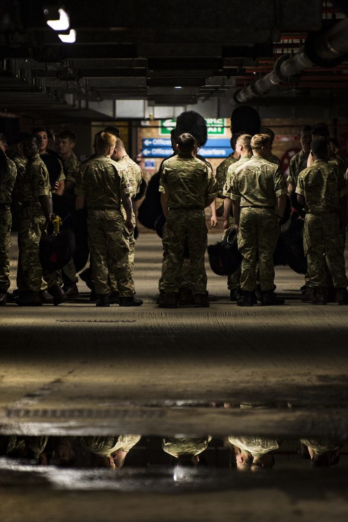 Briefing: The photograph shows the Sergeant Major giving the Guardsmen a brief in the underground car park at Wellington Barracks (Sergeant Rupert Frere RLC/PA Wire)