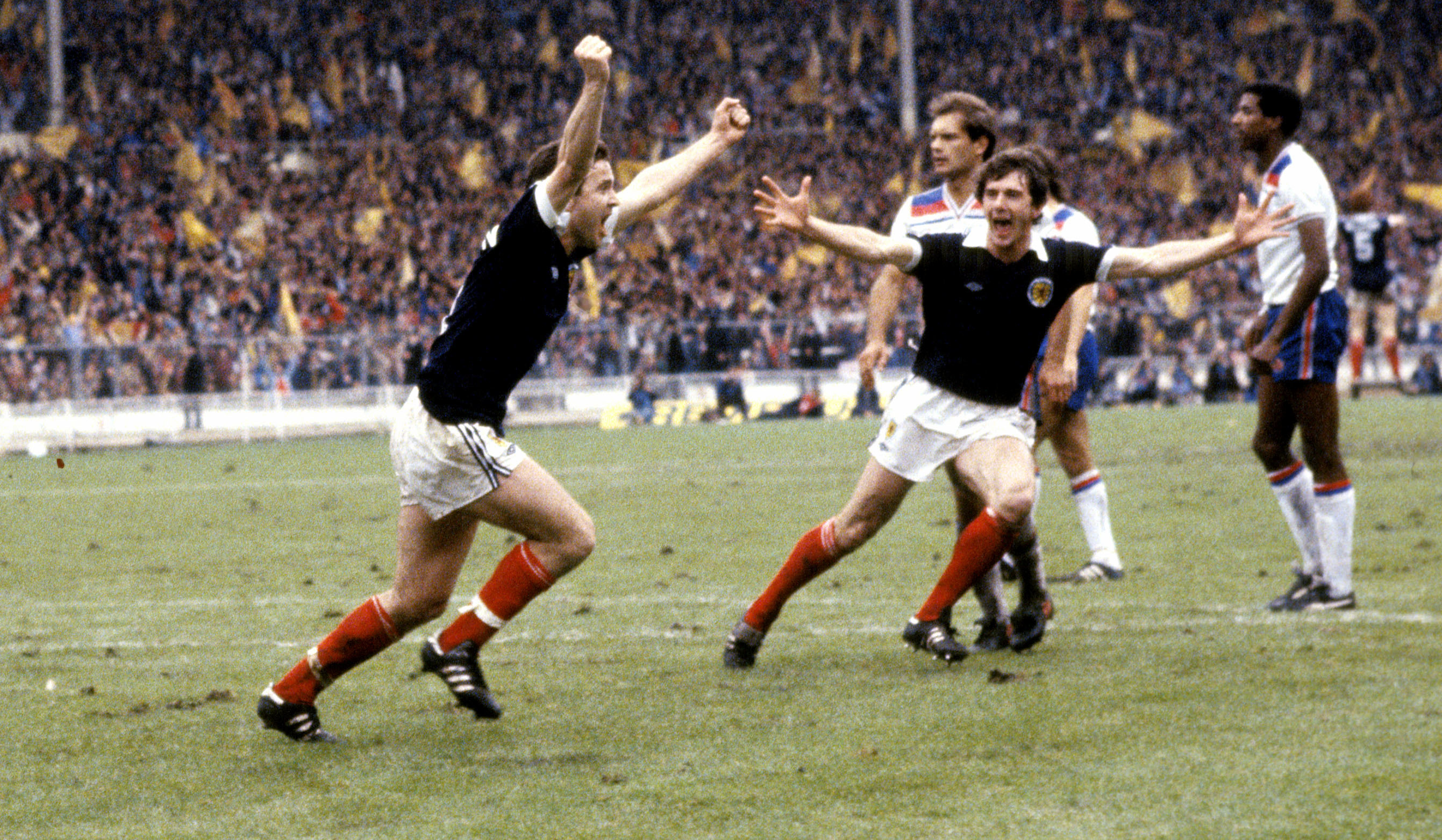 Scotland's John Robertson (left) celebrates his penalty goal with teammate Ray Stewart (SNS Group)