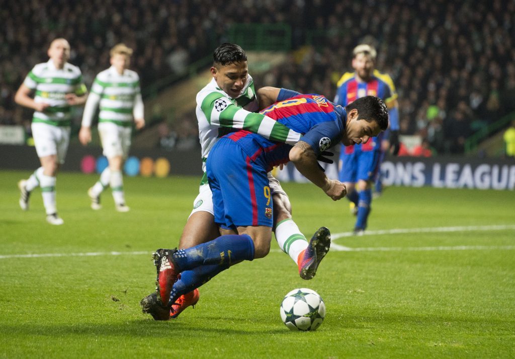 Emilio Izaguirre fouls Luis Suarez to concede a penalty for Celtic (SNS Group / Craig Foy)