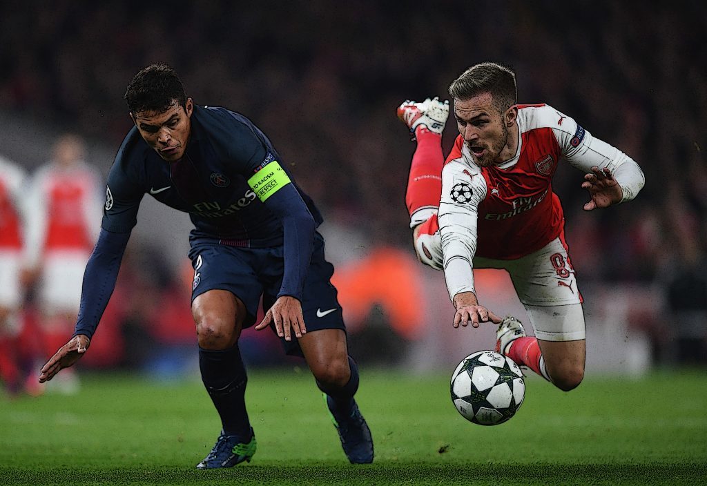 Aaron Ramsey of Arsenal (R) and Thiago Silva of PSG (Shaun Botterill/Getty Images)