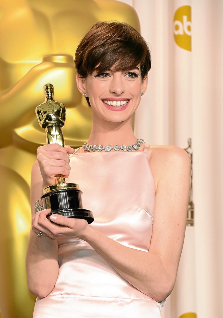 Anne Hathaway, winner of the Best Supporting Actress award for 'Les Miserables (Jason Merritt/Getty Images)